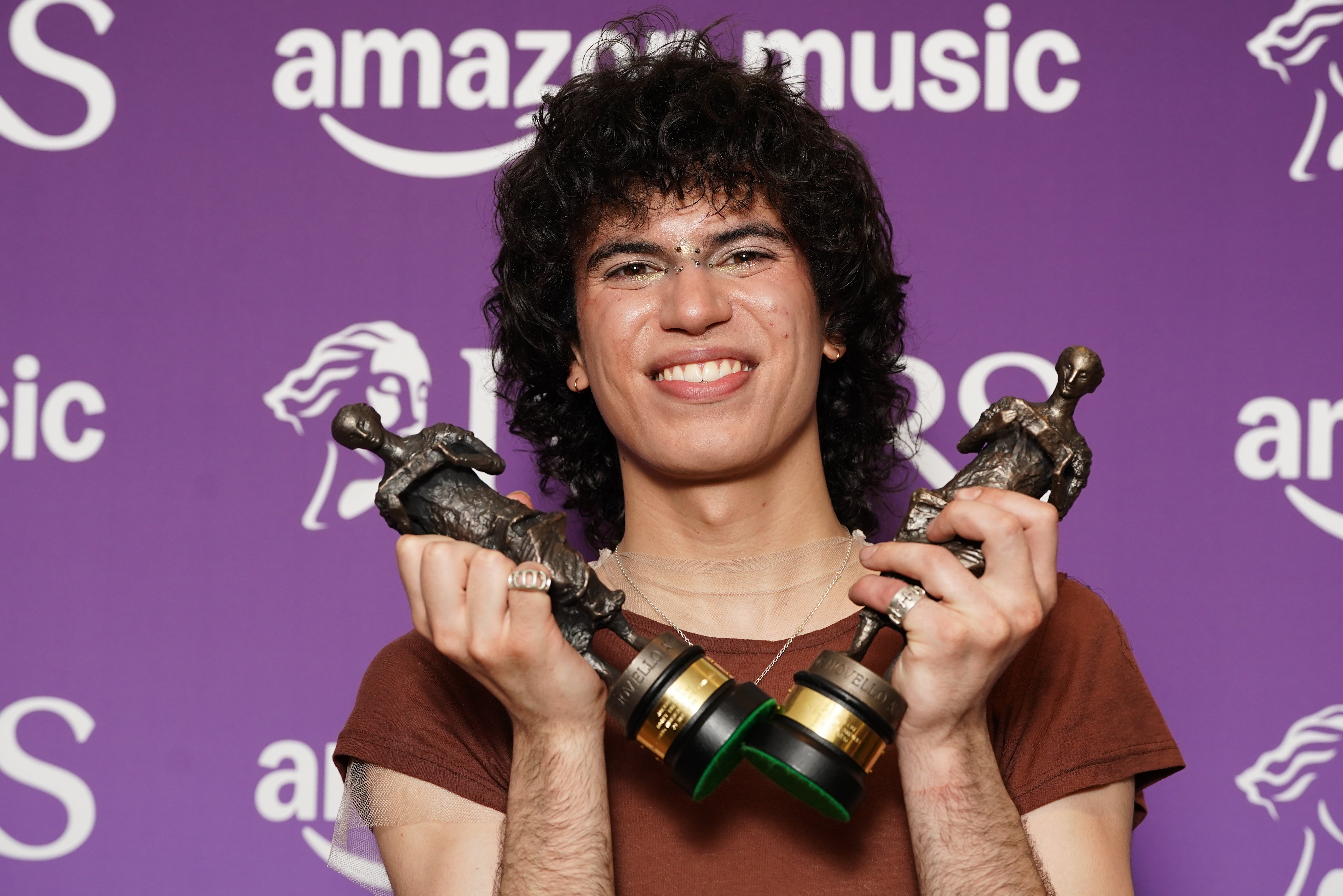 Jacob Alon with his Rising Star with Amazon Music award and Best Song Musically and Lyrically award for Don't Fall Asleep.