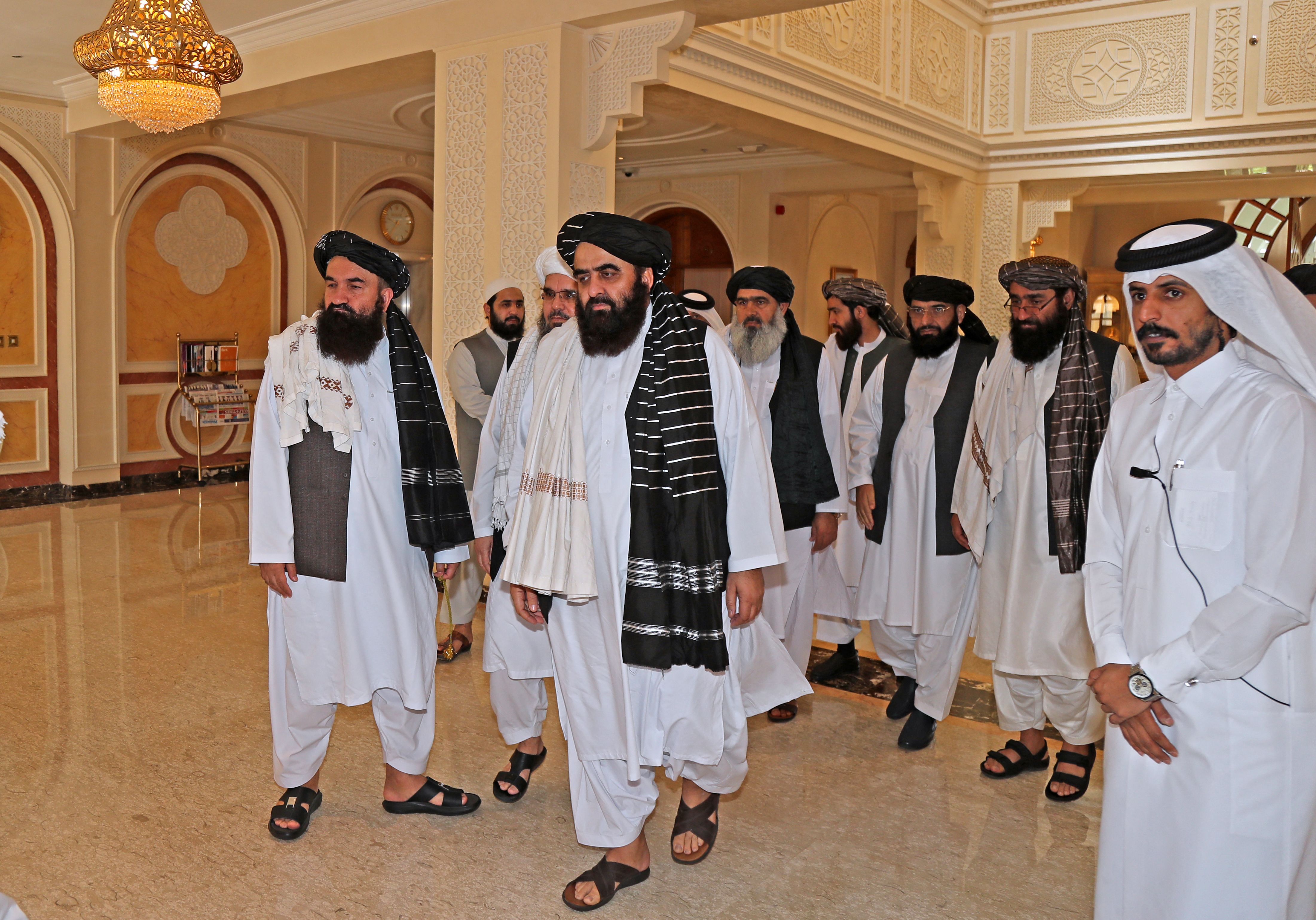 Members of the Taliban delegation arrive for a meeting with foreign diplomats in Qatar's capital Doha in 2021 (AFP/Getty)