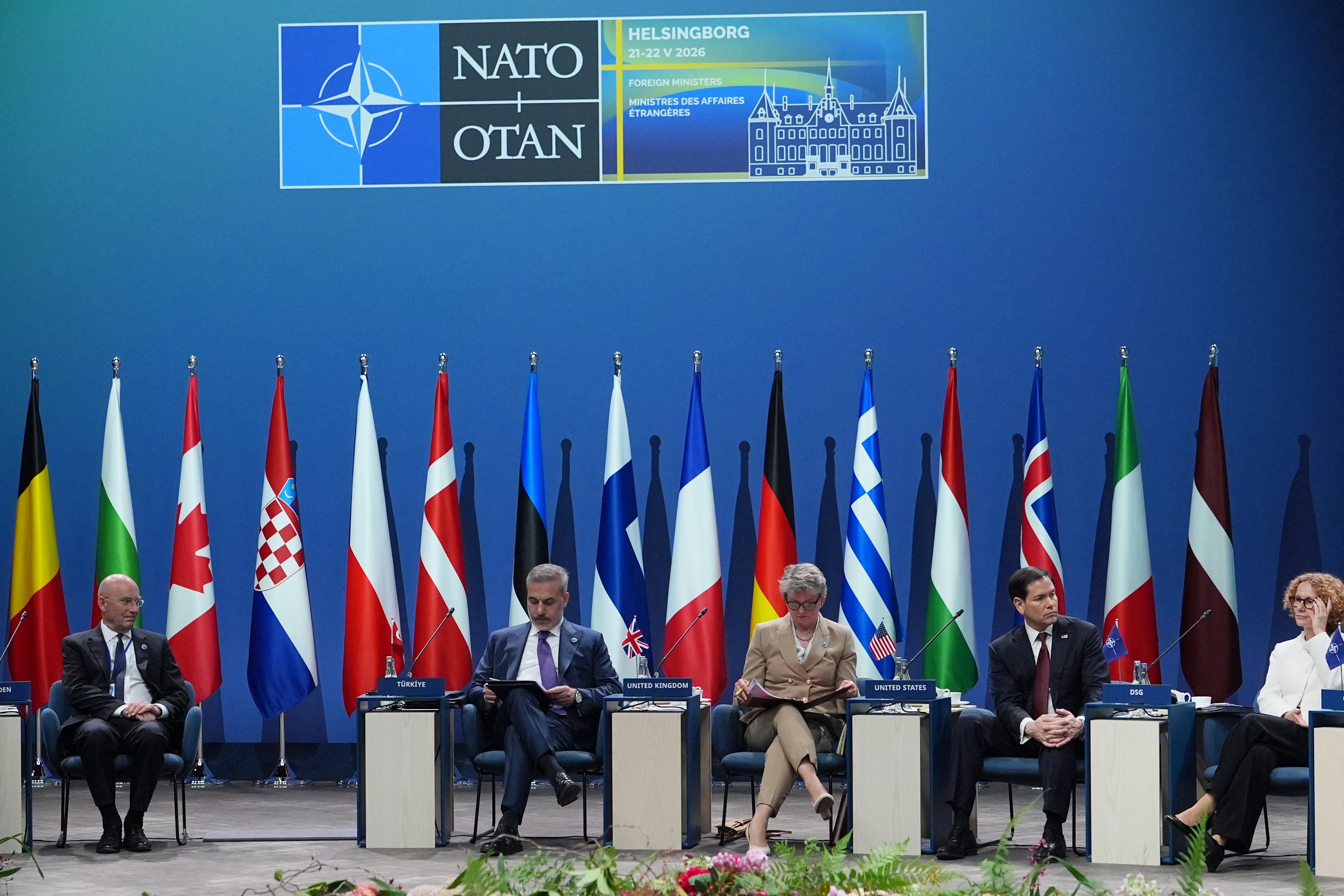 Yvette Cooper (centre) at the NATO summit in Sweden (AP)