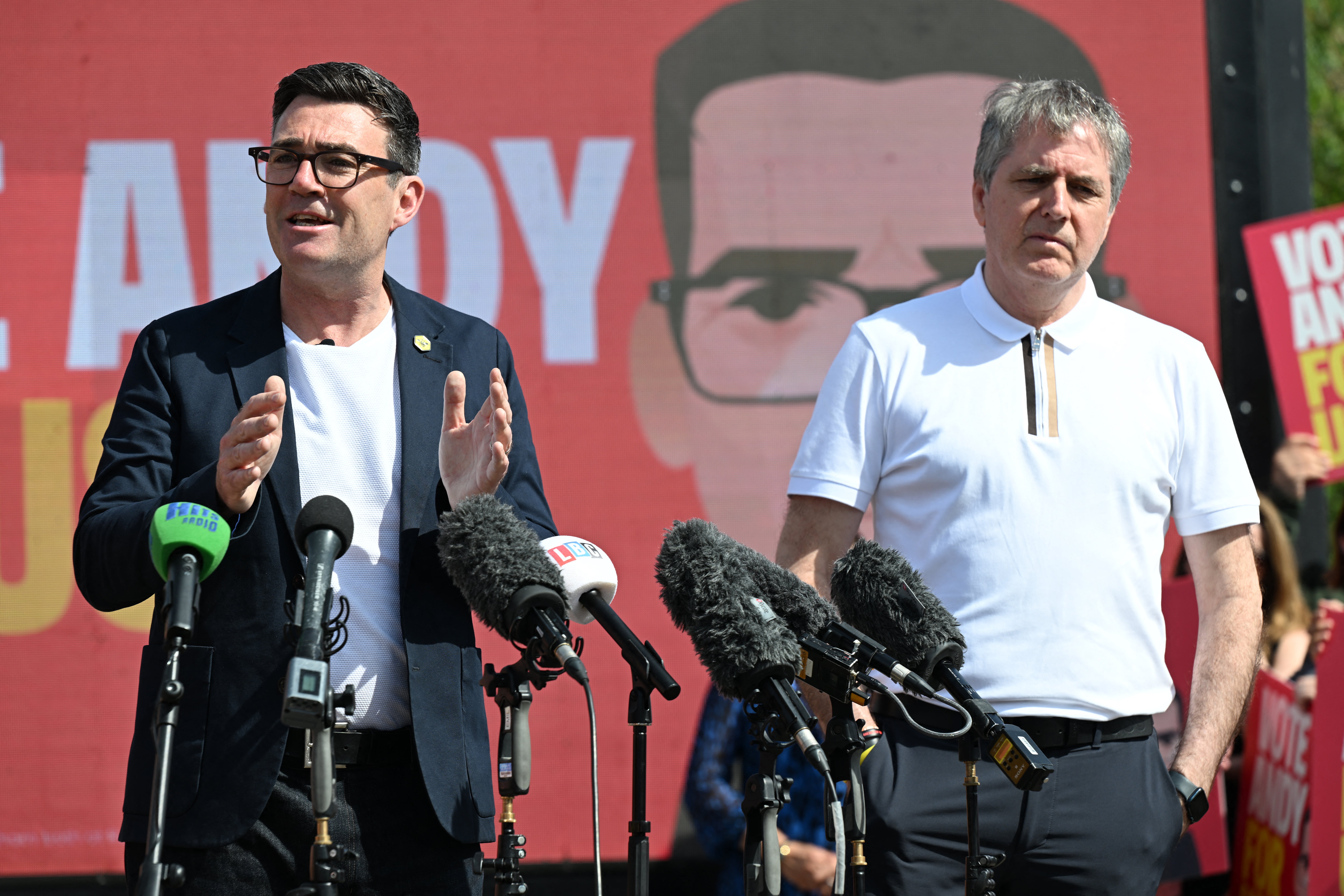 Greater Manchester Mayor Andy Burnham (L) speaks beside Steve Rotheram, Liverpool mayor (AFP/Getty)