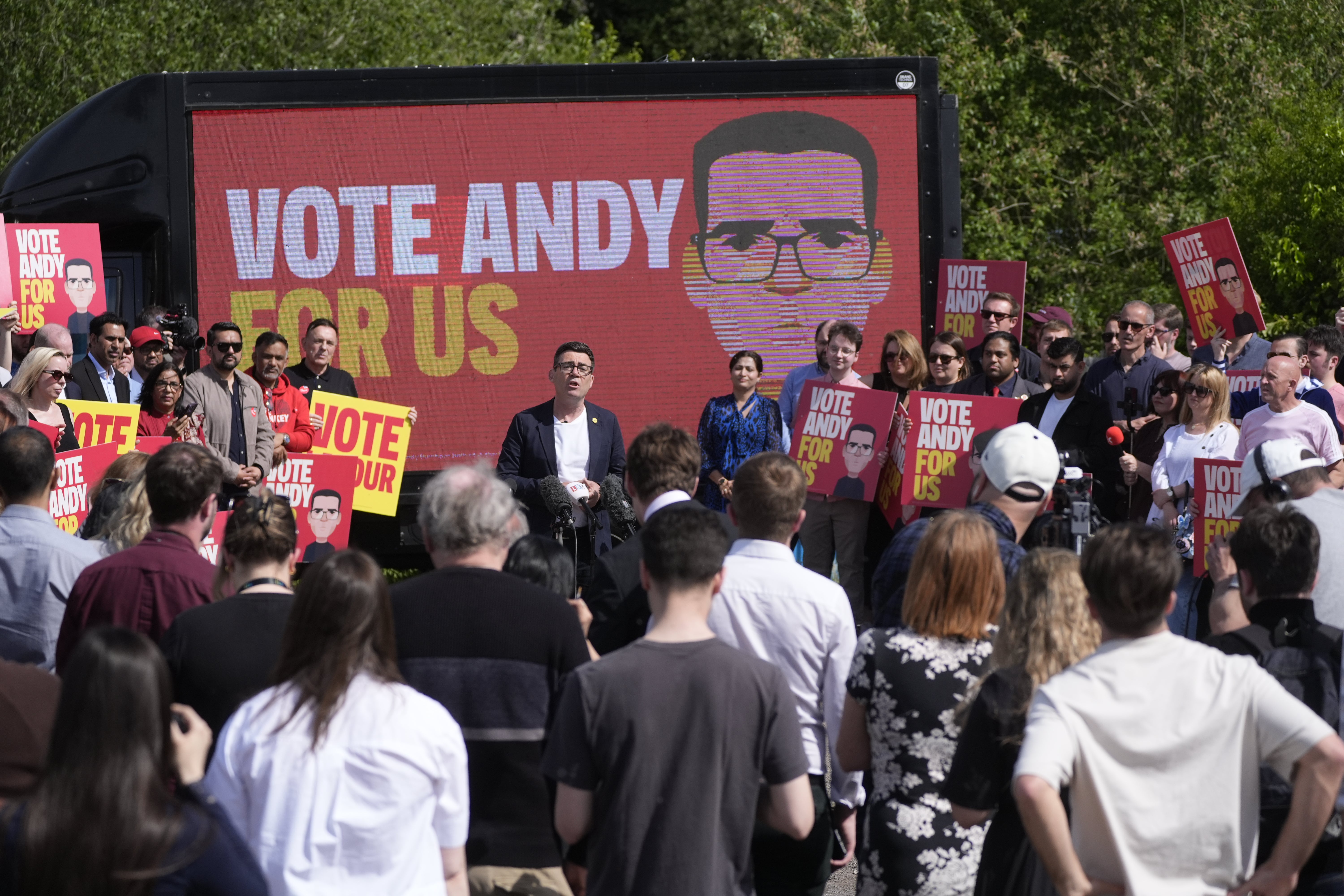 Andy Burnham giving a speech surrounded by supporters at the launch of his campaign as Labour’s candidate for the Makerfield by-election (Peter Byrne/PA)