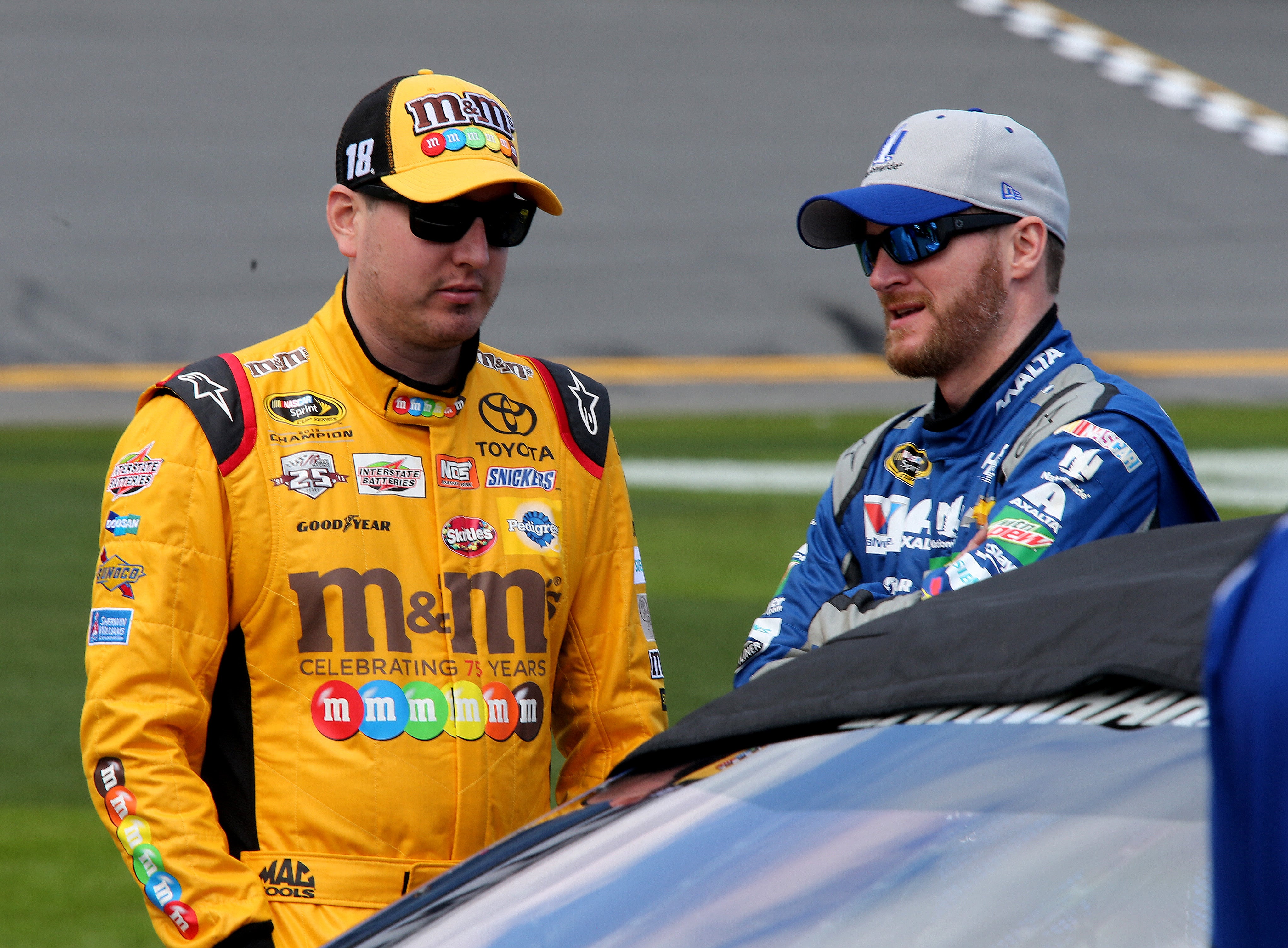 Kyle Busch and his one-time rival Dale Earnhardt Jr. at the NASCAR Sprint Cup Series Daytona 500 at Daytona International Speedway in 2016 (Getty)