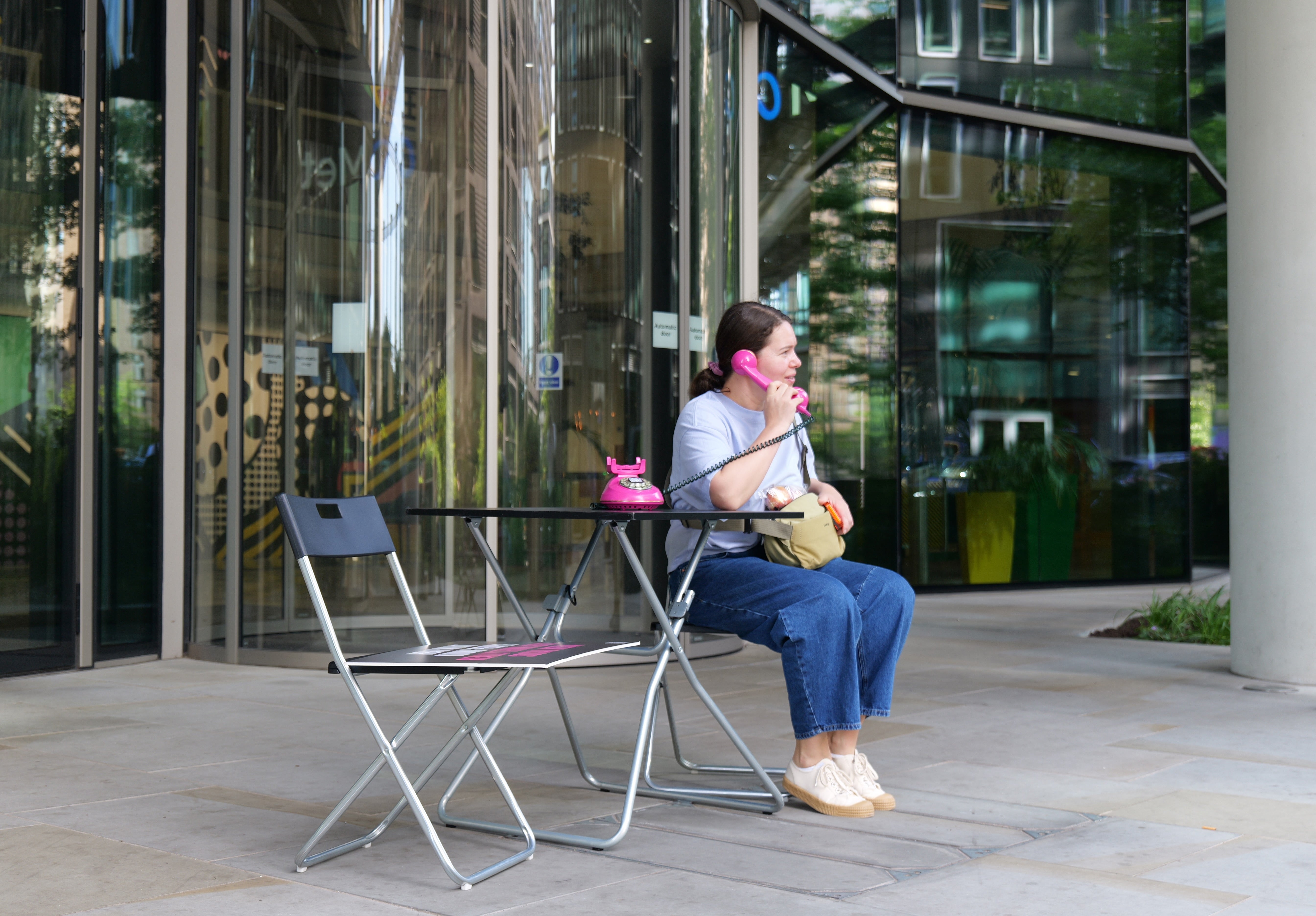 The protesters installed phones with prerecorded messages on what young people want from social media