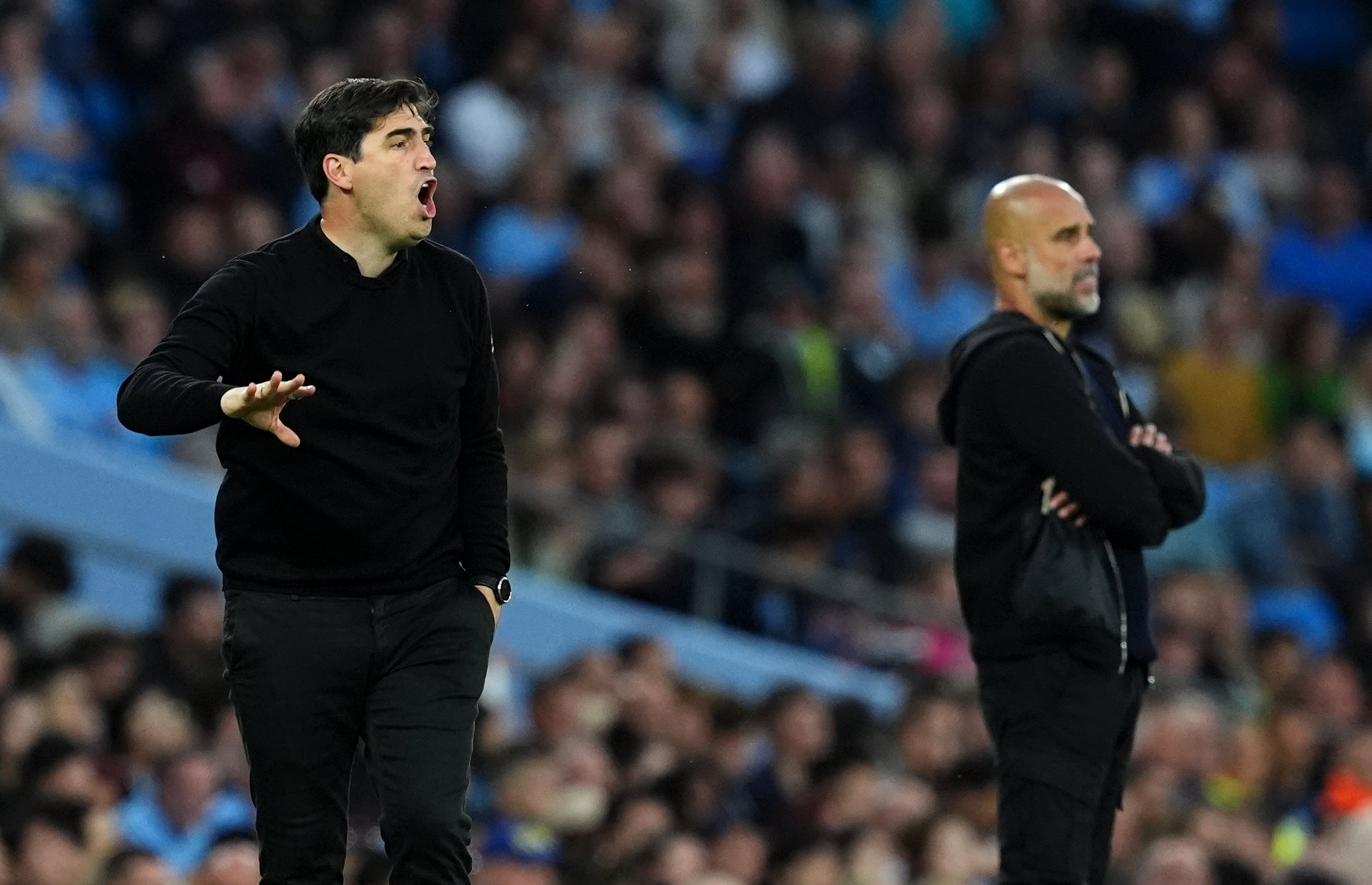 Bournemouth head coach Andoni Iraola (left) came up against Pep Guardiola (right) as both a player and manager (Martin Rickett/PA)