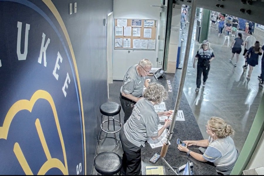 Milwaukee Brewers fan Annette Flynn (right) says was wrongly denied a raffle jackpot during a home game at American Family Field in Milwaukee, Wisconsin, on July 7, 2023