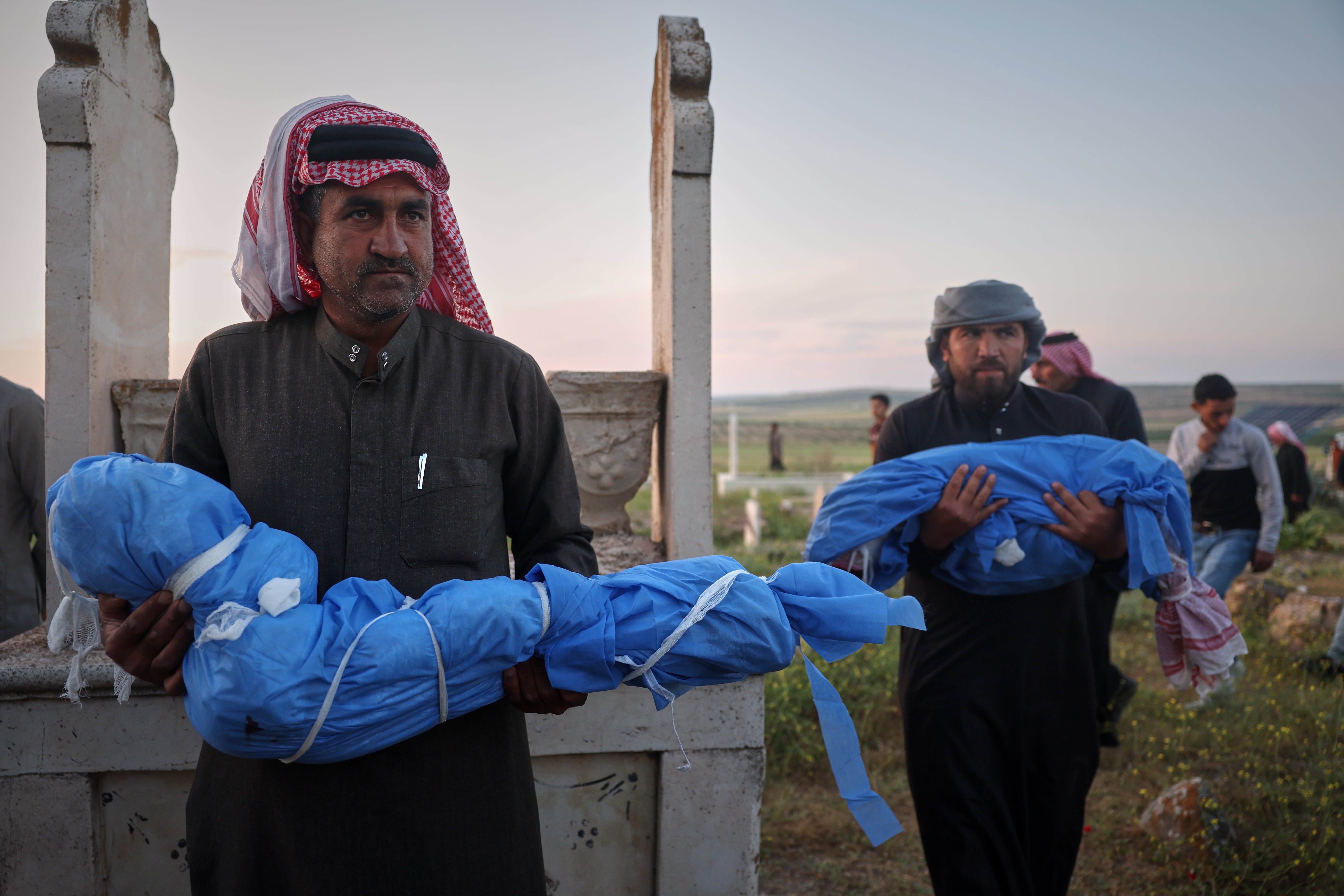 independent.co.uk - Ghaith Alsayed - A grieving father buries his 6-year-old after a land mine kills 3 children in Syria's Idlib