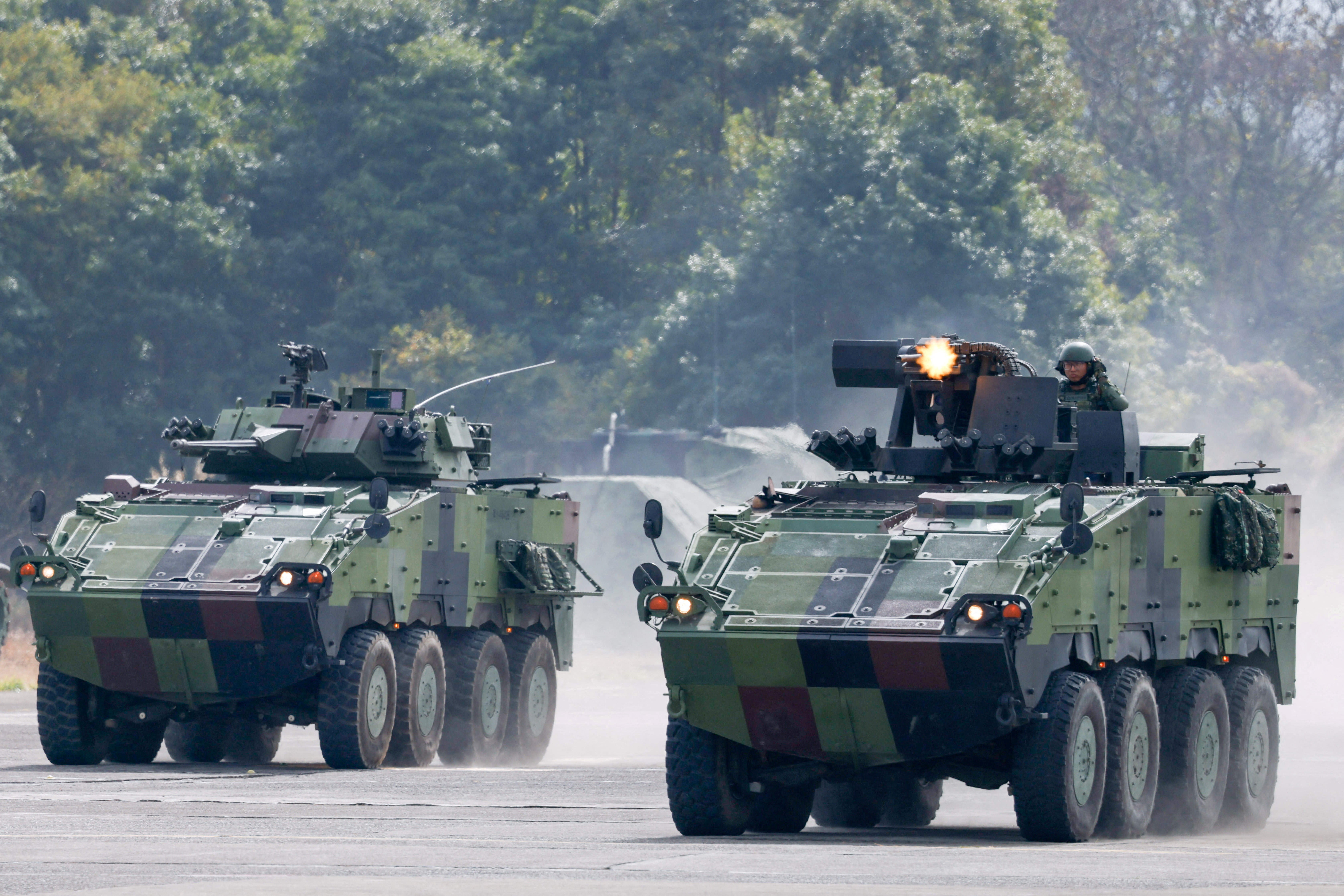 Soldiers operate CM-32 armored vehicles during the annual military exercise in Taichung, Taiwan