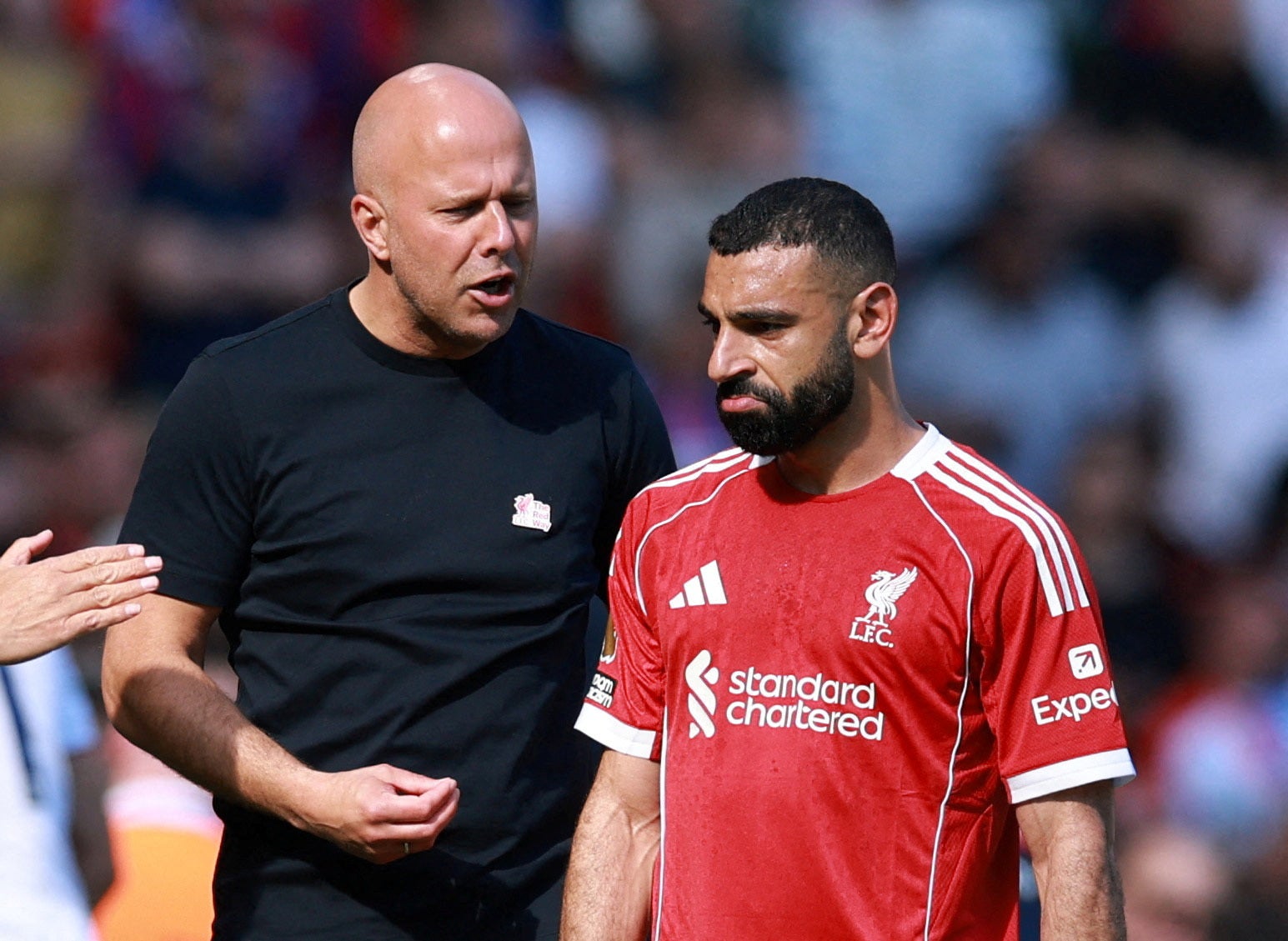 Liverpool's Mohamed Salah with manager Arne Slot after being substituted