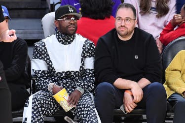 <p>Floyd Mayweather Jr. is fighting back after business advisor Jona Rechnitz, seen here with the champion prizefighter, allegedly stole millions from him</p>