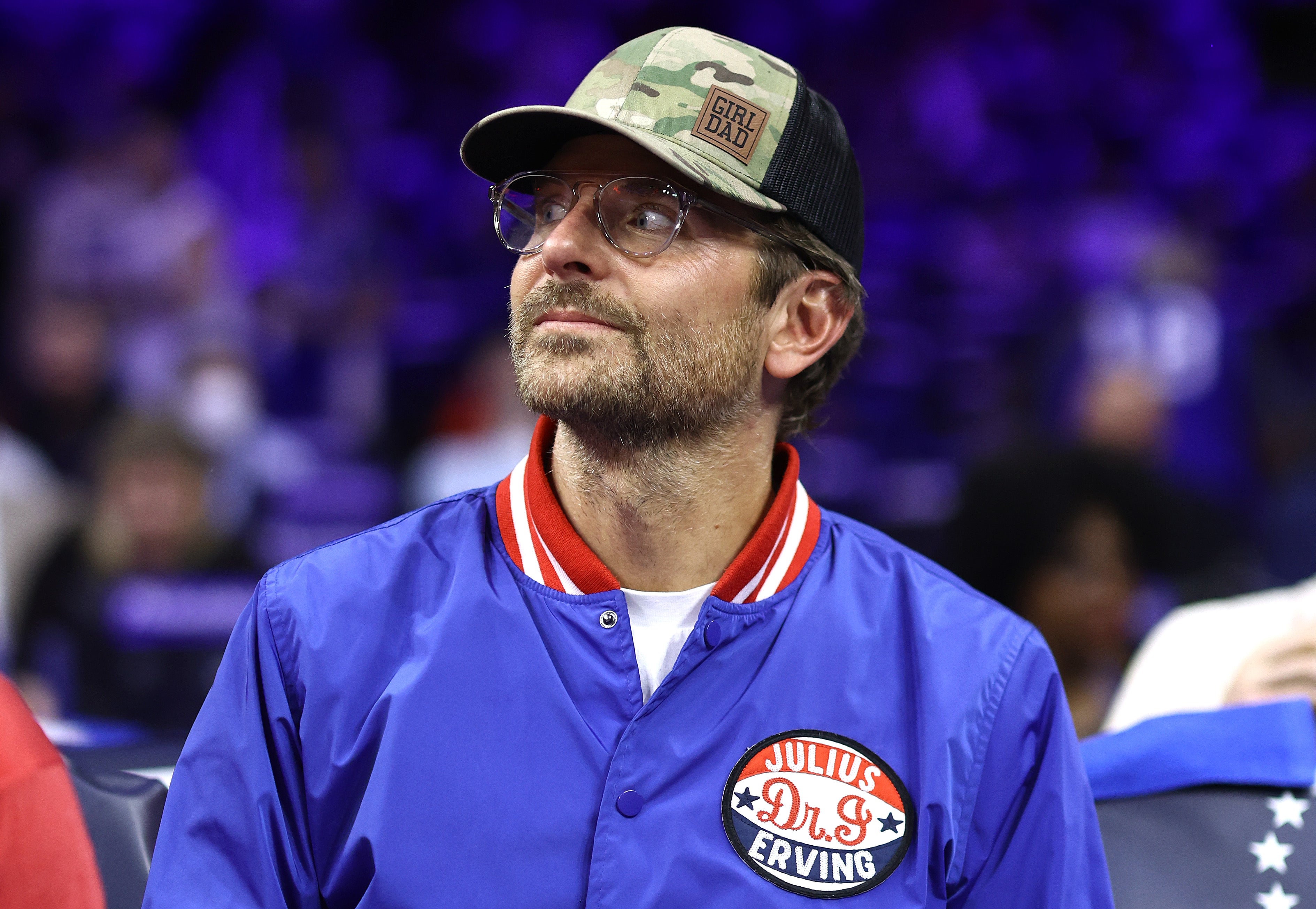Bradley Cooper wore a camo trucker hat printed with ‘Girl Dad’ to a New York Knicks game in 2024. He is father to nine-year-old Lea De Seine Shayk Cooper, whom he shares with his ex Irina Shayk