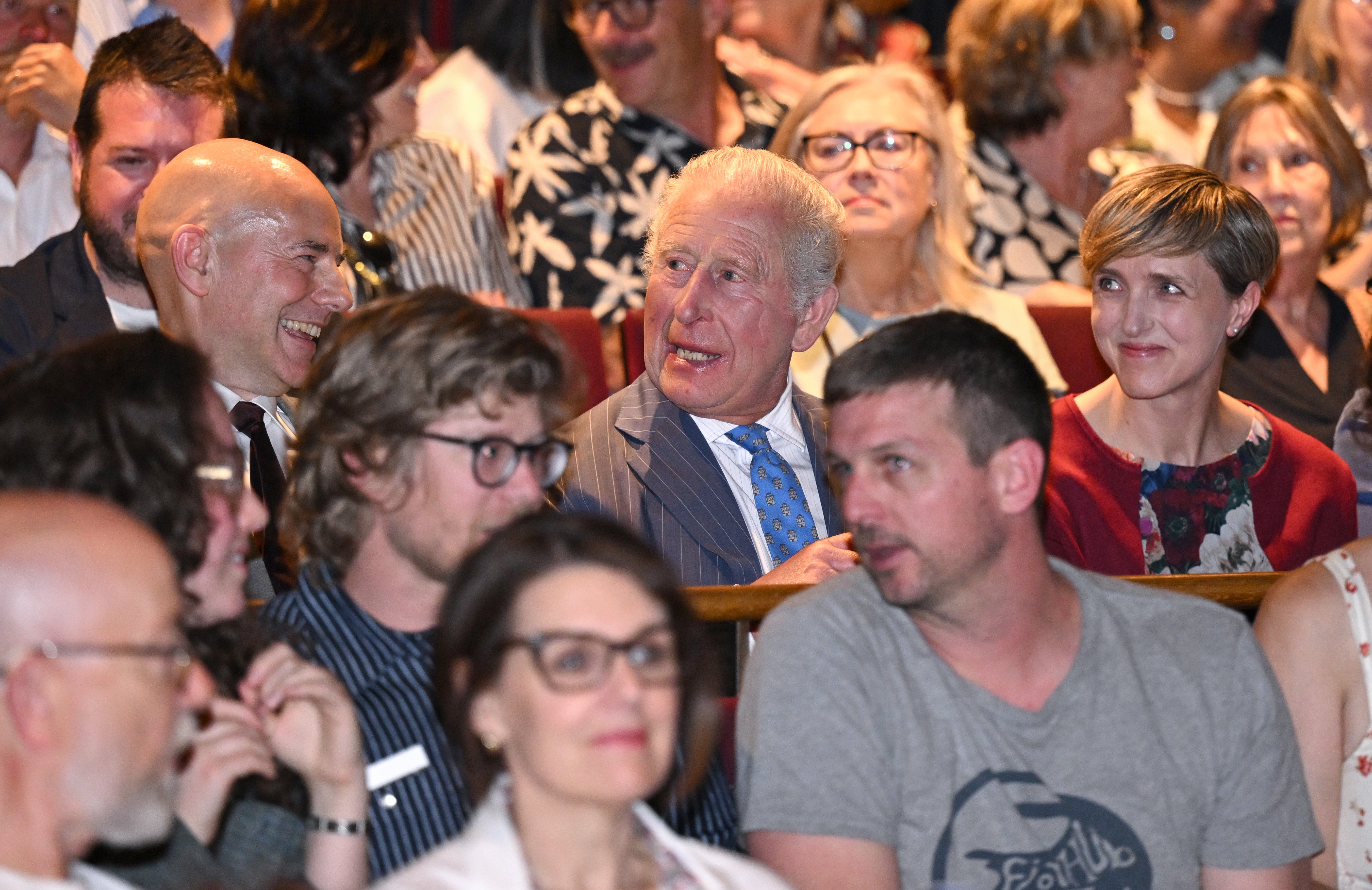 The King surprised the audience when he took his seat in the theatre