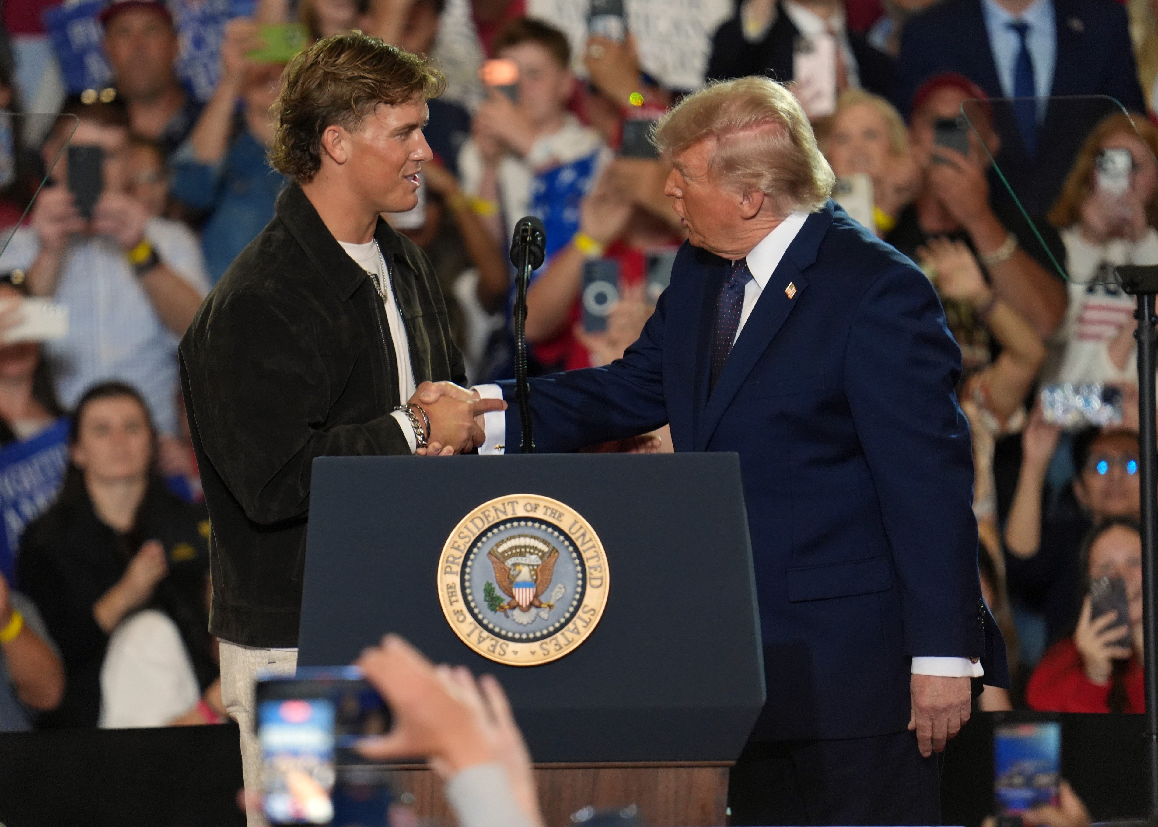 New York Giants quarterback Jaxson Dart appeared with President Trump on Friday during a campaign rally for Rep. Mike Lawler in New York
