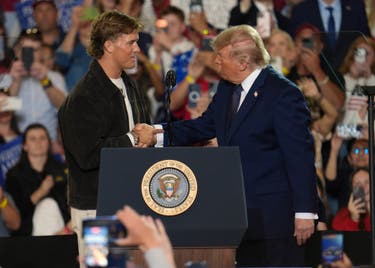 <p>New York Giants quarterback Jaxson Dart introduced Donald Trump on Friday as he campaigned in New York on behalf of Rep. Mike Lawler</p>