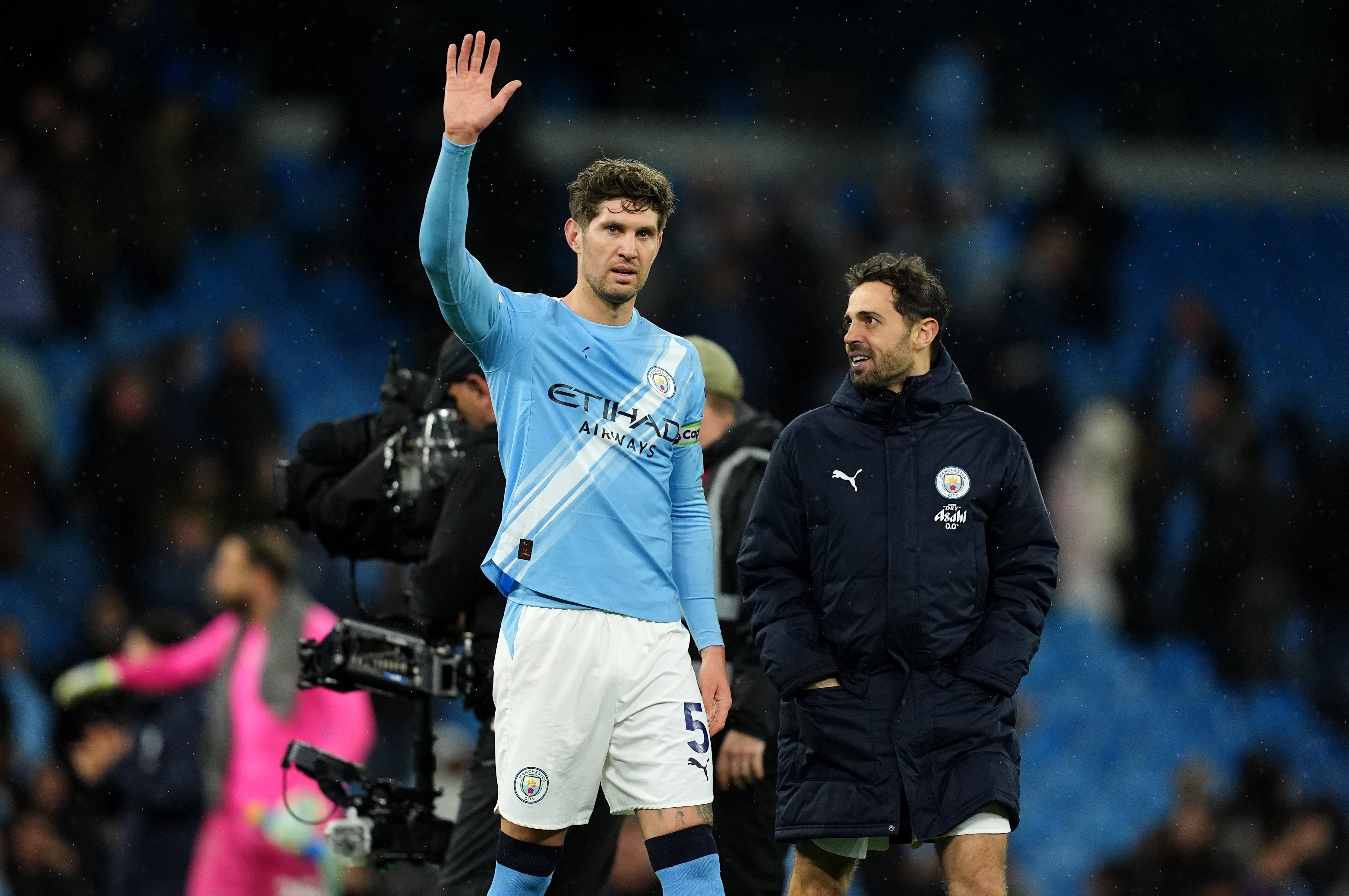 John Stones, left, and Bernardo Silva, right, are also leaving City (Martin Rickett/PA) (PA Wire)