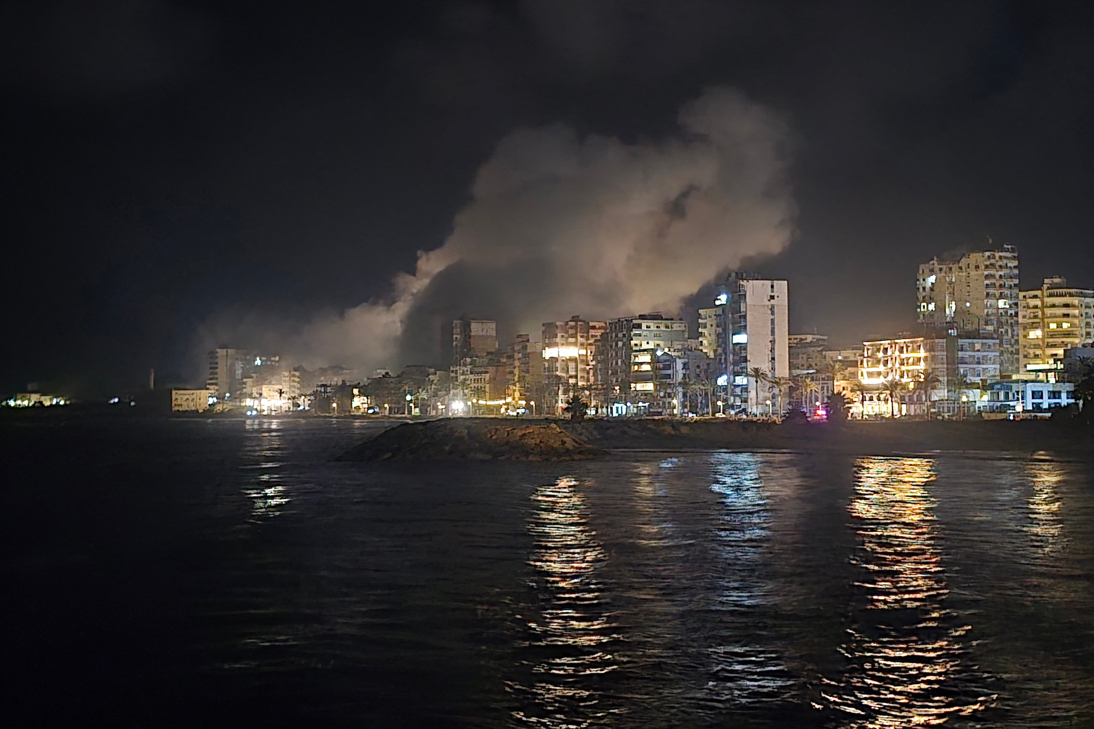 Smoke rises from the site of an Israeli strike that targeted an area in the southern Lebanese coastal city of Tyre on May 23