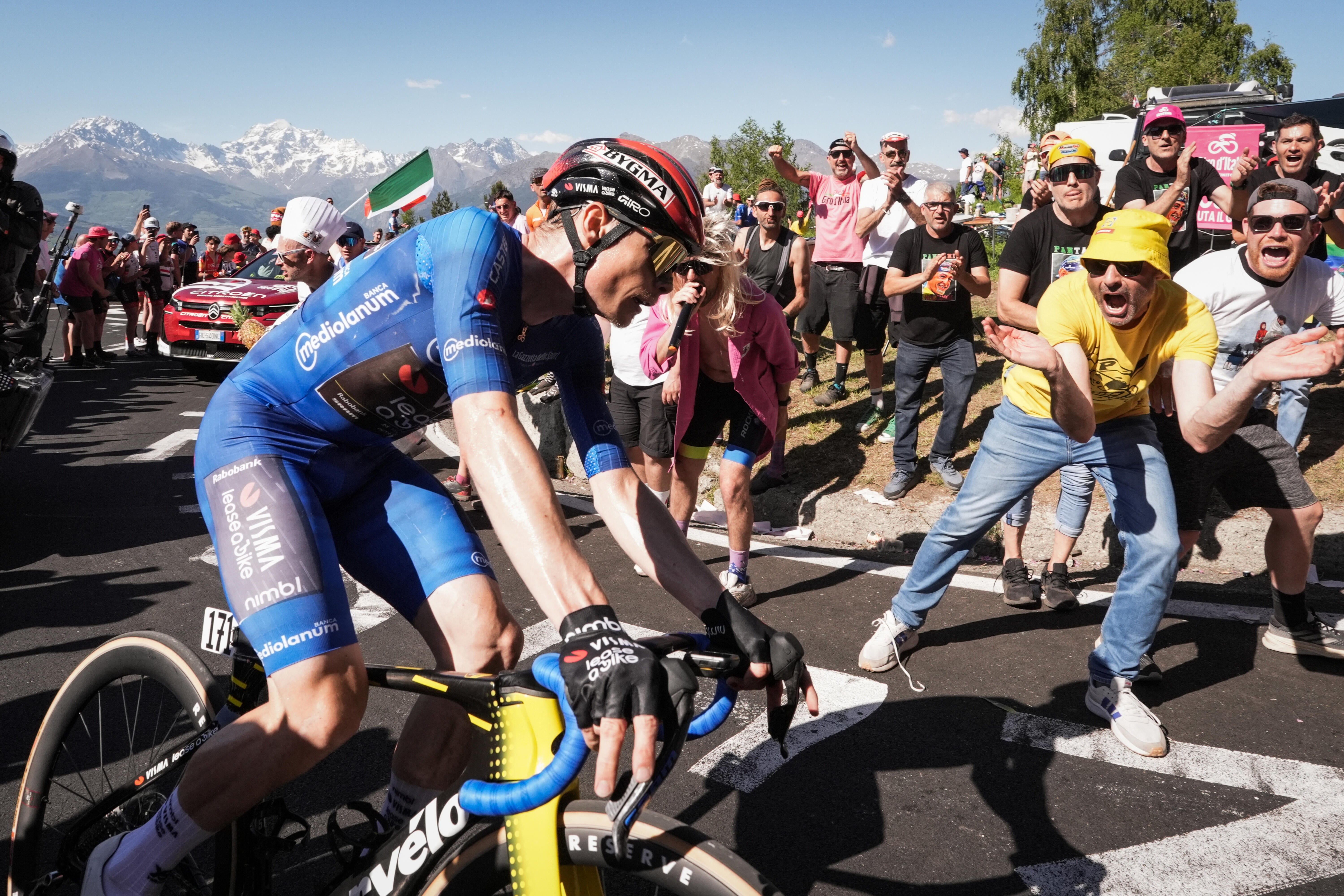 Jonas Vingegaard pedals on his way to win the 14th stage (AP)