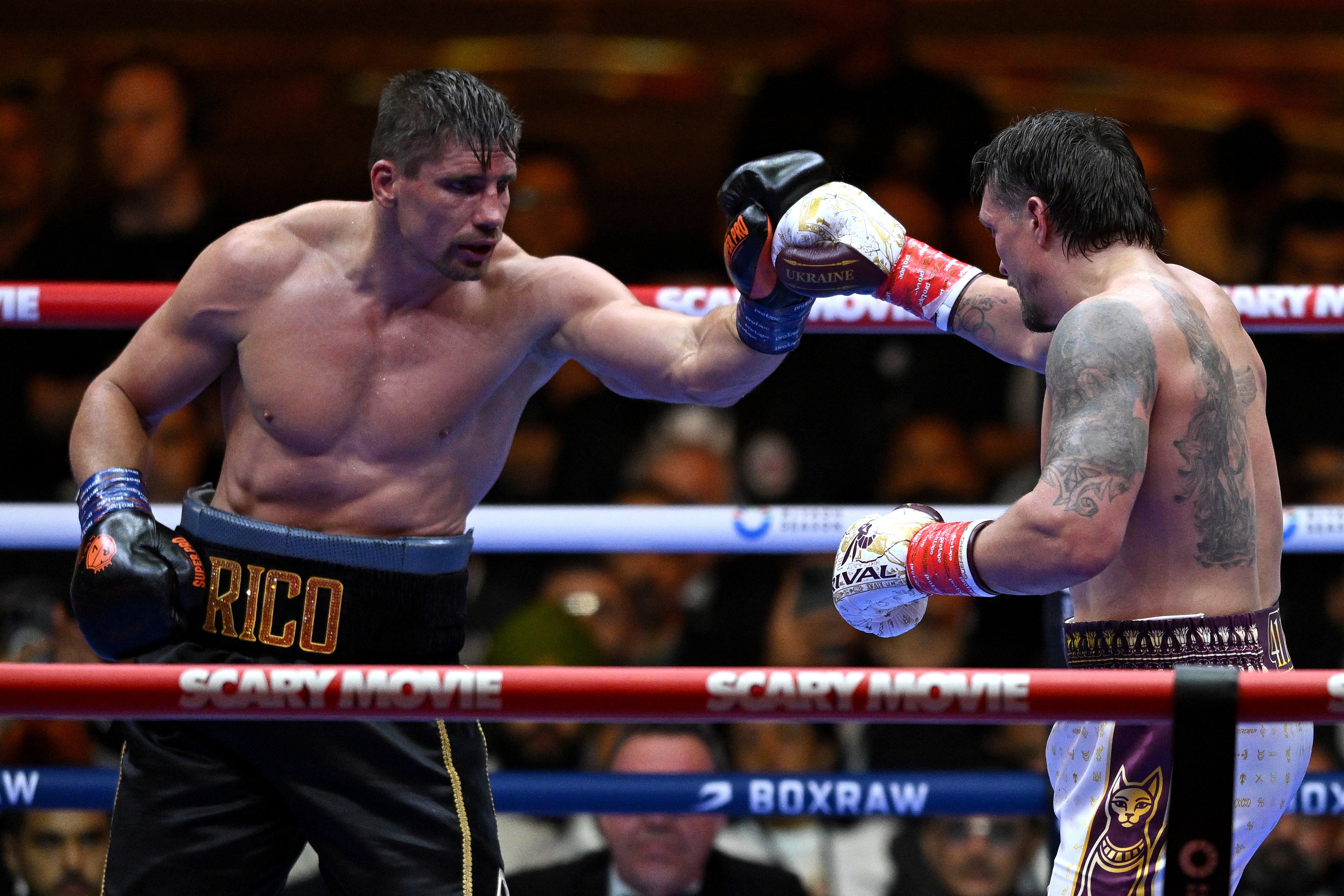 Rico Verhoeven and Oleksandr Usyk touch gloves