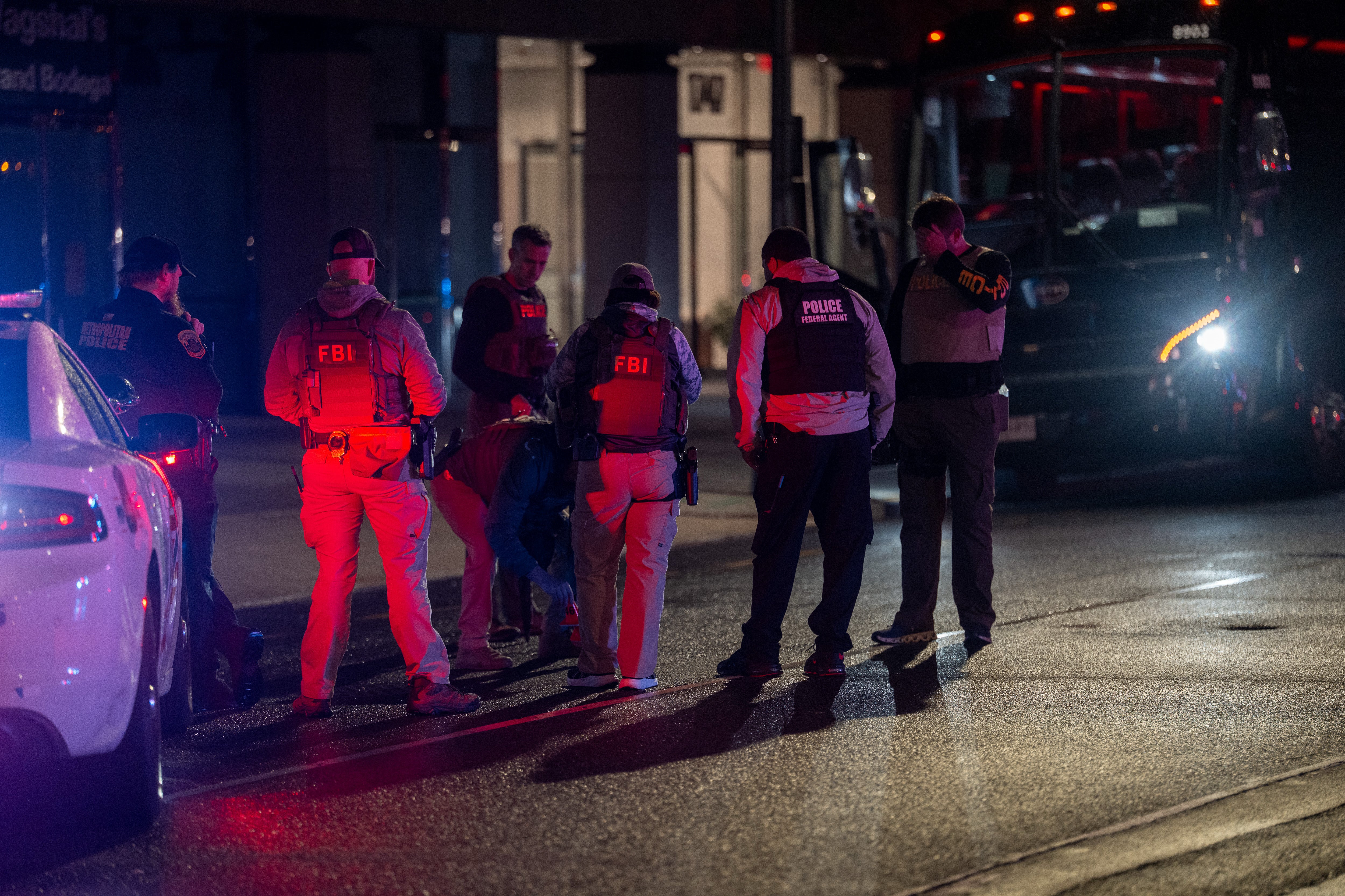 FBI and other federal law enforcement agents at the scene of a shooting near the White House (Getty)