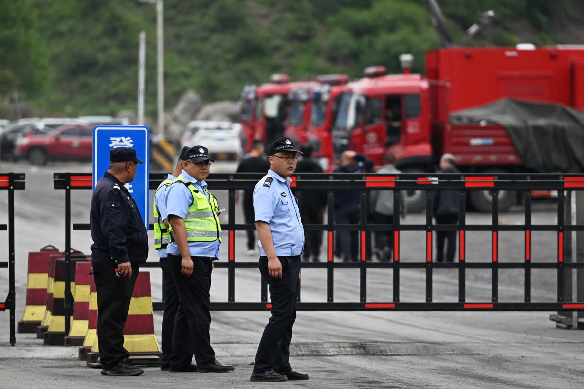 China mine blast death toll revised to 82