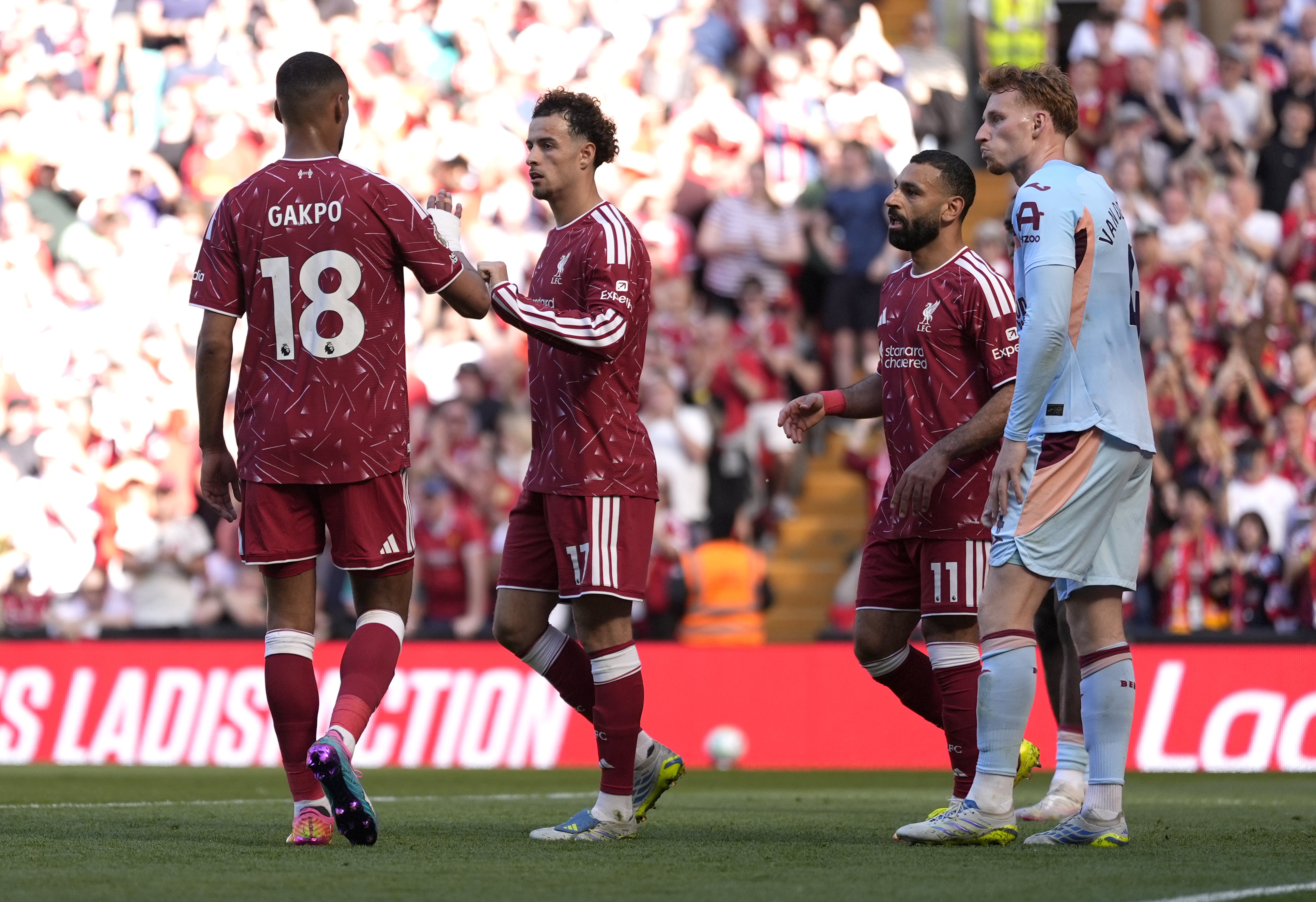 Salah, second right, set up Curtis Jones’ opener at Anfield