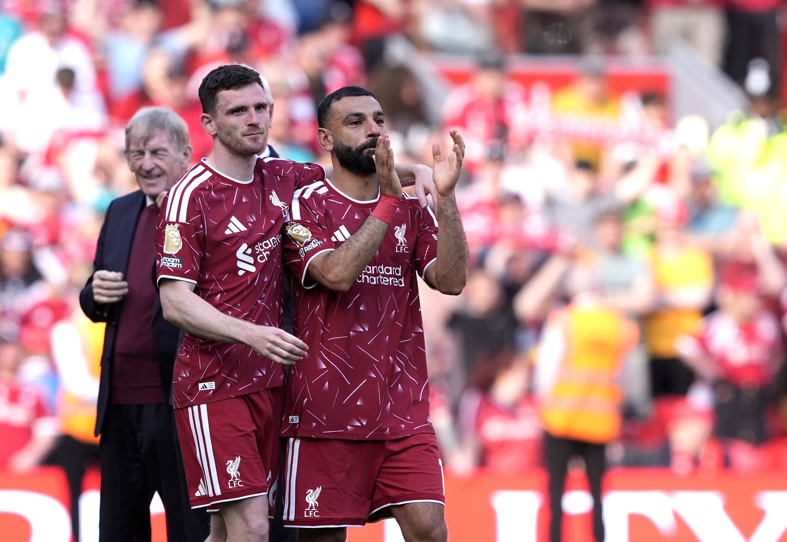 Salah and Andy Robertson were emotional after full-time at Anfield (Peter Byrne/PA)