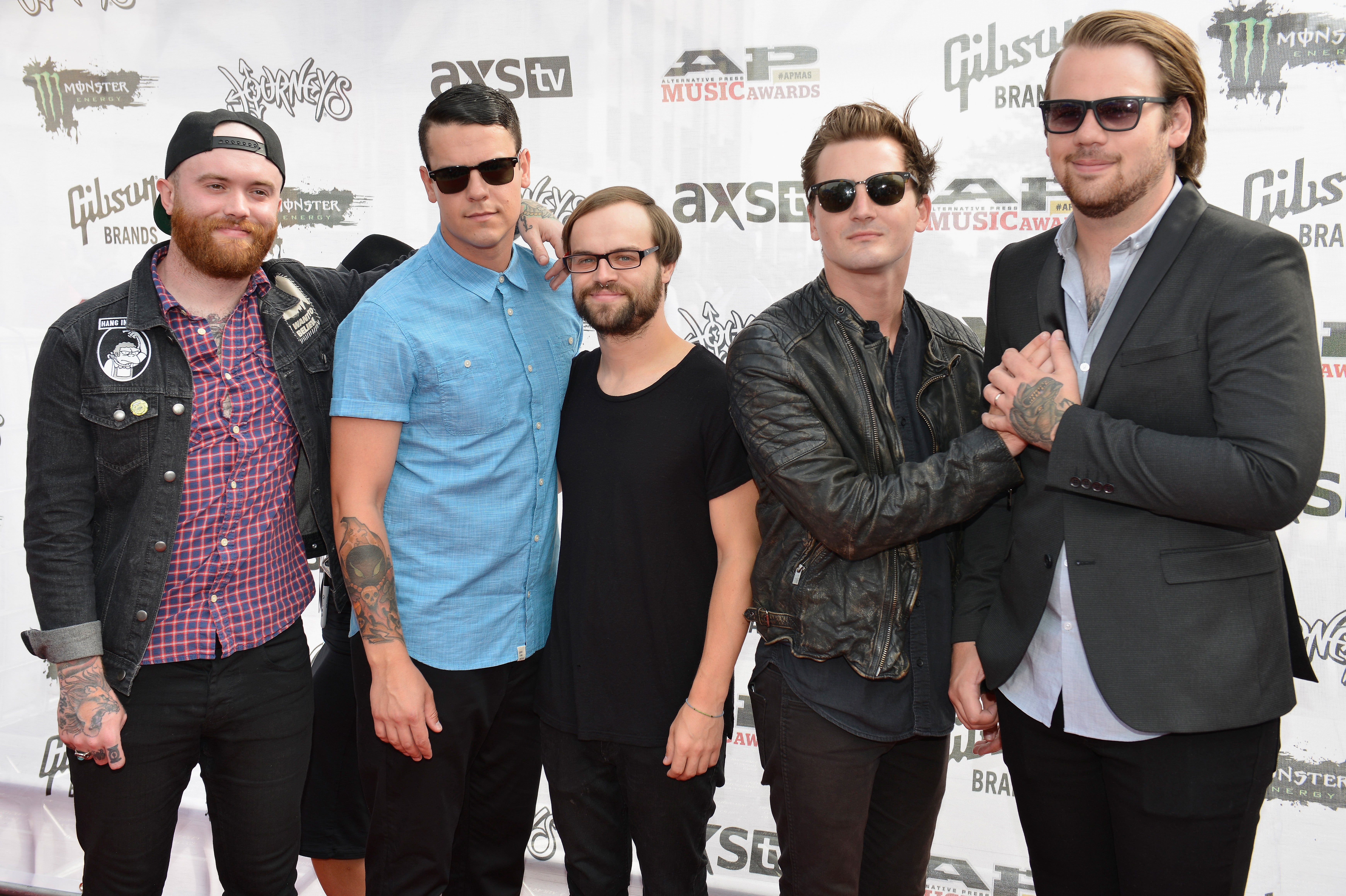 Caleb Shomo with the other members of Beartooth (Taylor Lumley, Oshie Bichar, Kamron Bradbury and Brandon Mullins) in Cleveland, Ohio in 2015