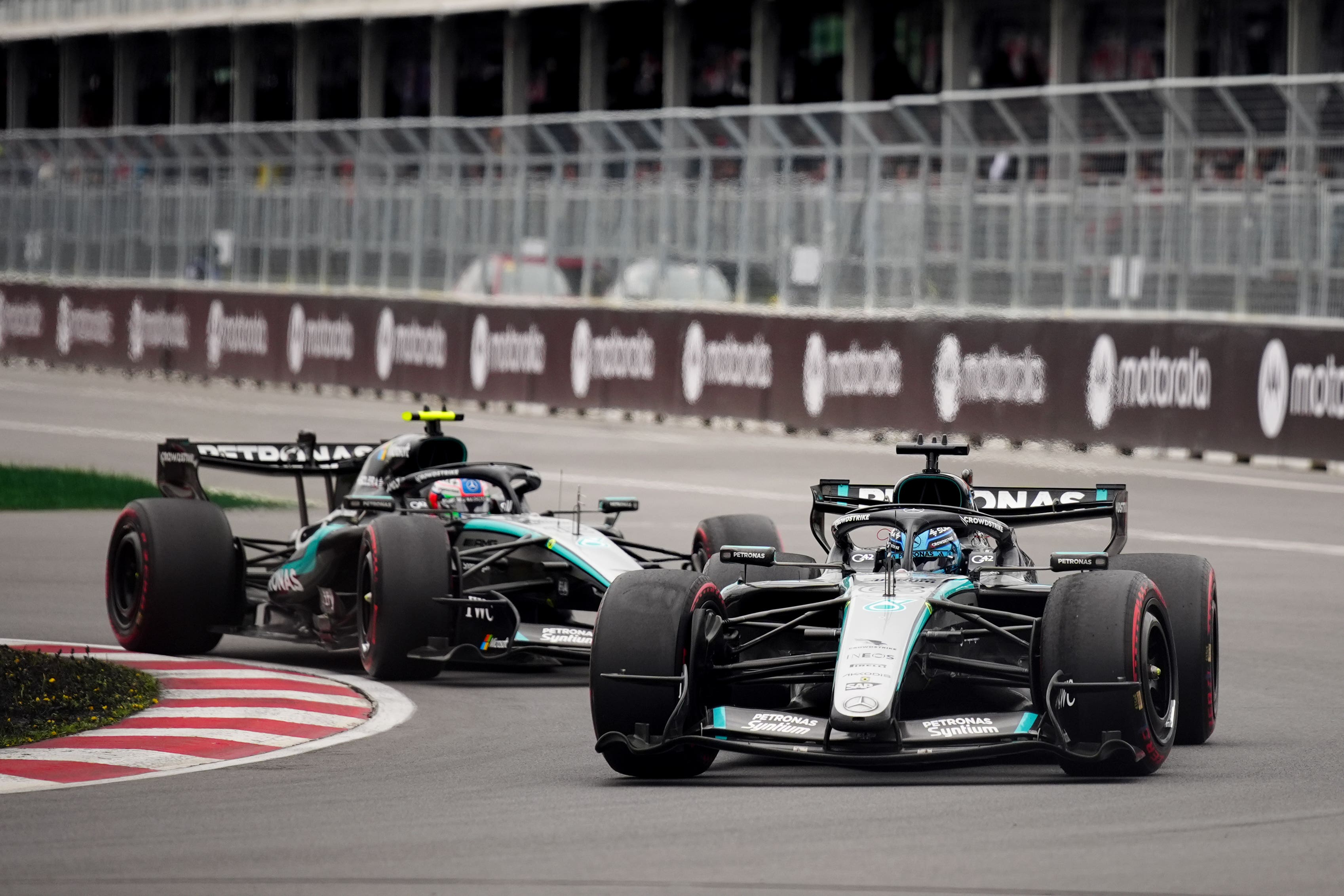 Russell and Antonelli exchanged the lead on several occasions throughout the race (Bradley Collyer/PA)