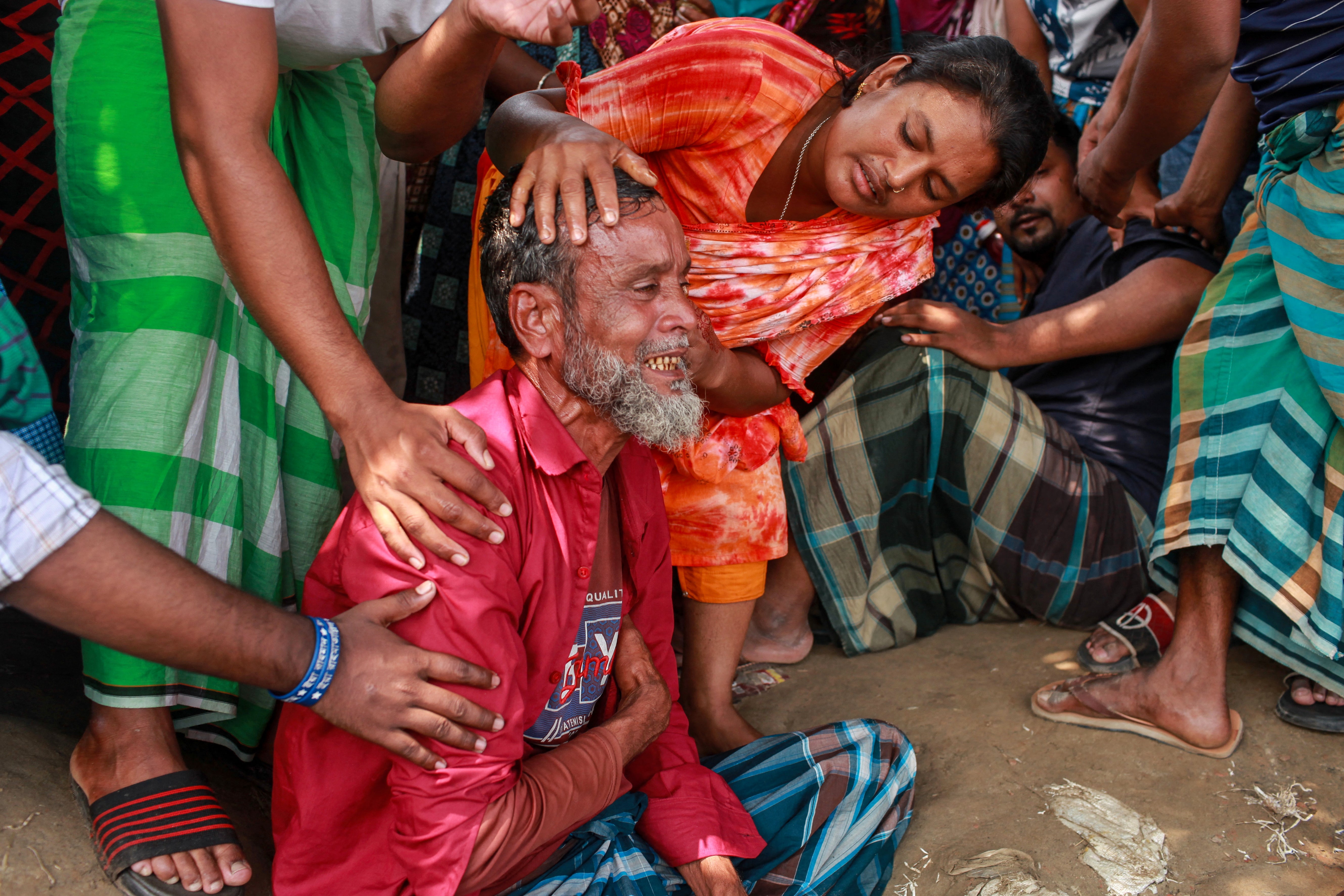 At least 15 people died and 10 were injured after a truck carrying iron rods and numerous passengers overturned on a major highway in central Bangladesh