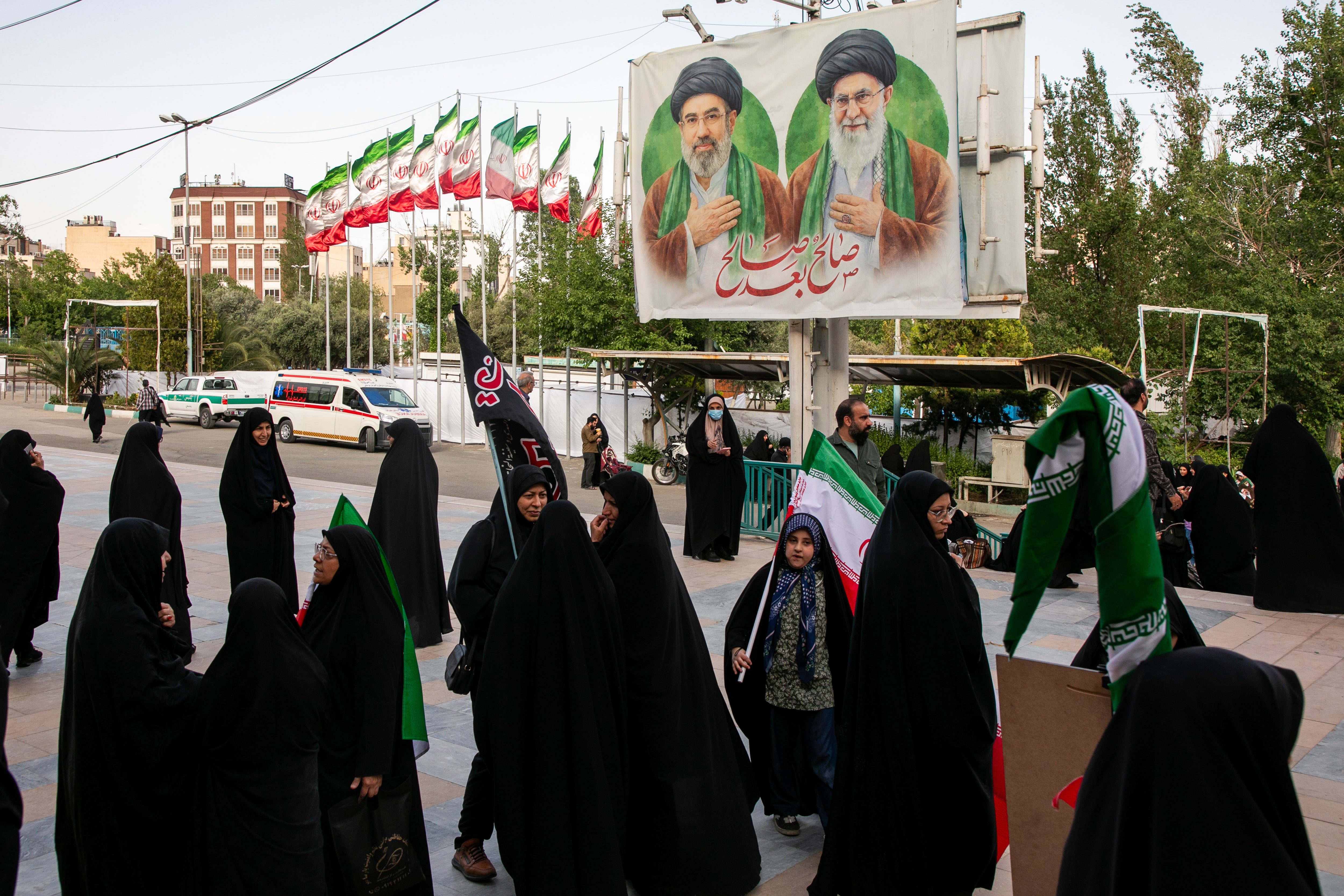 Iranians gather outside the Imam Khomeini Mosalla Mosque during an event to commemorate those killed in the current US-Israeli war (Getty)