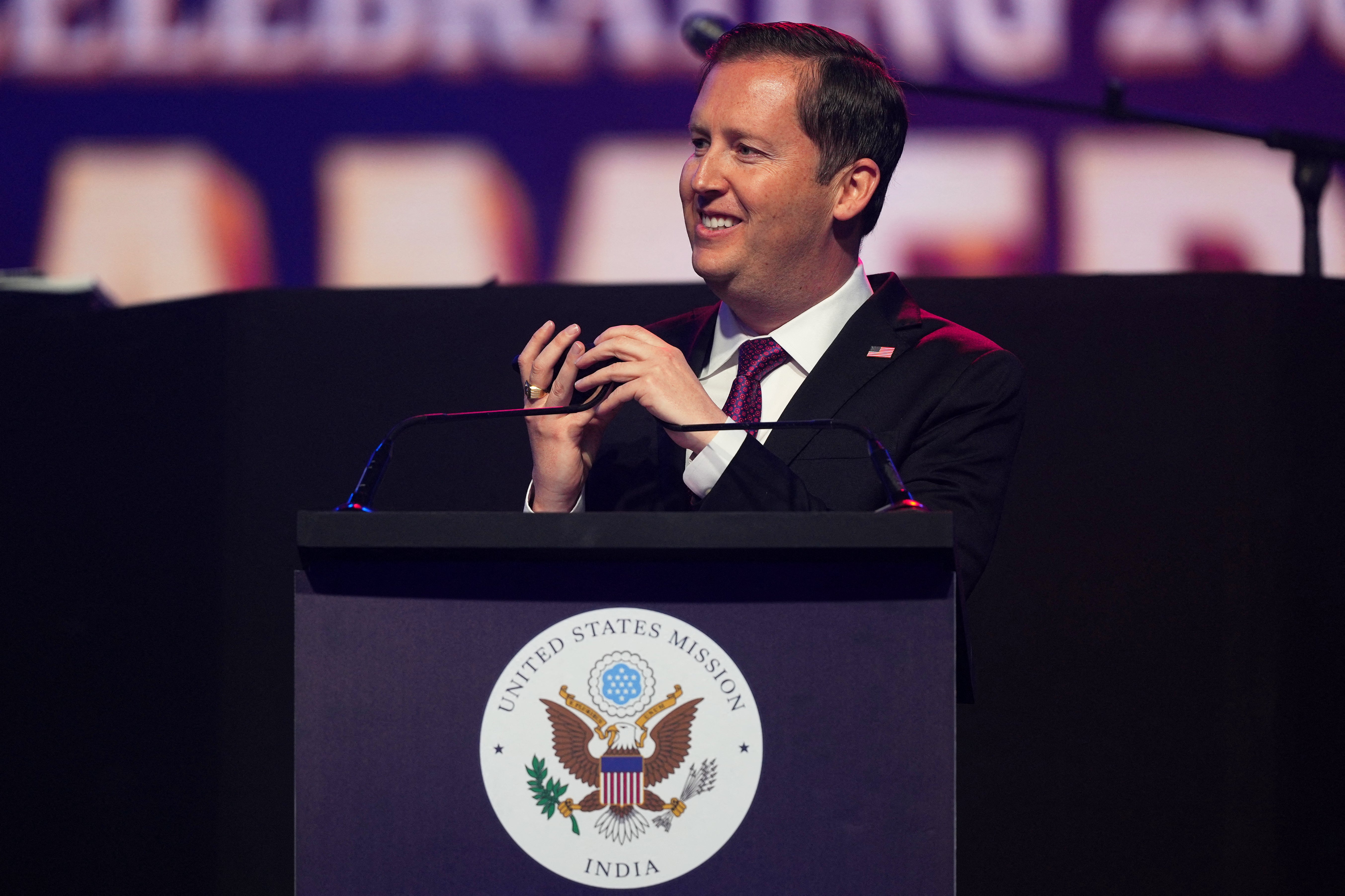 US ambassador to India Sergio Gor speaks to President Donald Trump on the phone at an event celebrating the United States' 250th anniversary