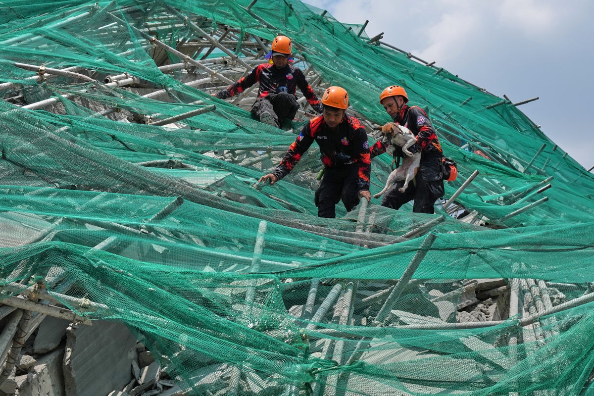 At least three dead and many people missing after major hotel collapse