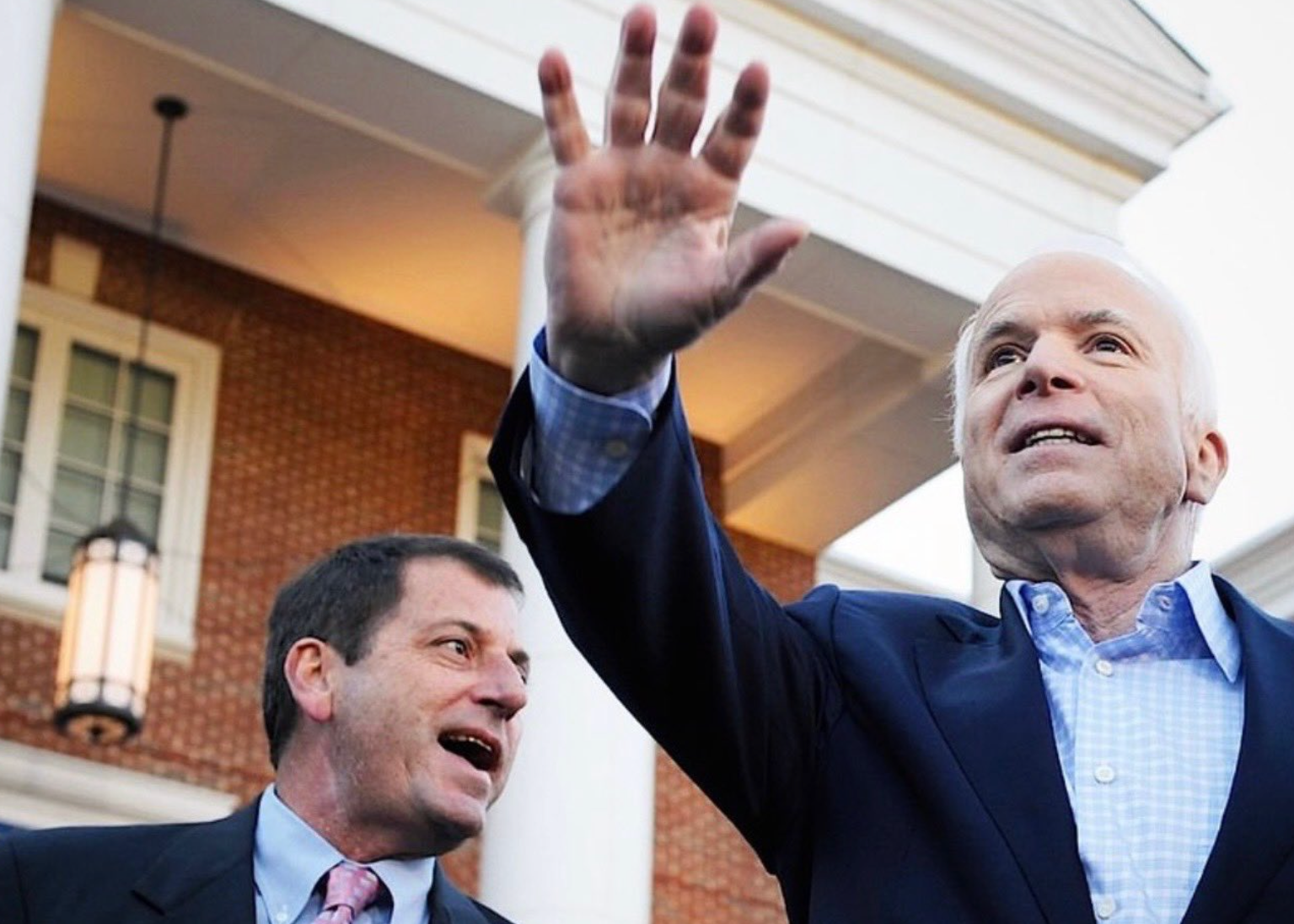 McCain (left), pictured with his adopted father John
