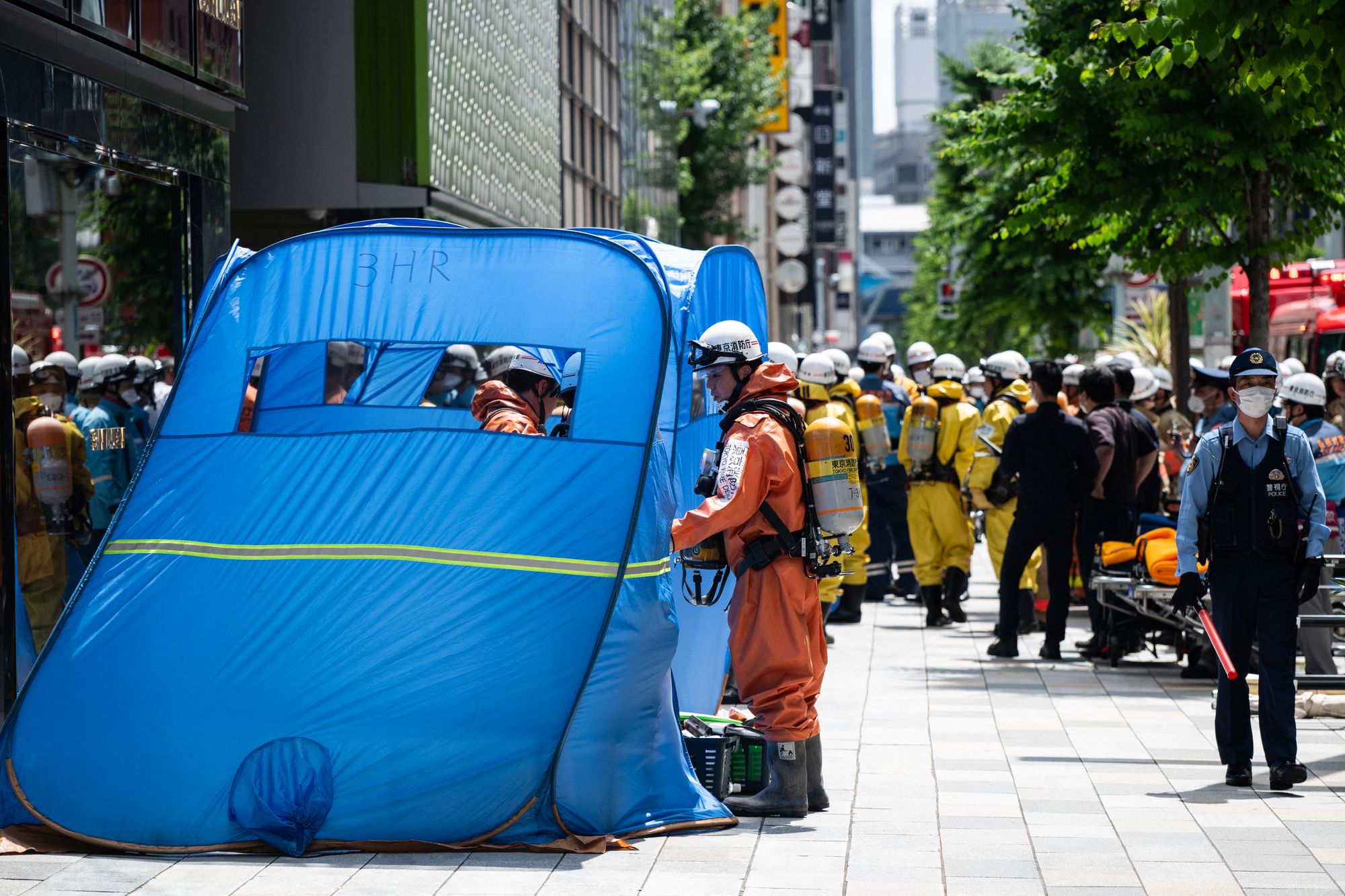 Emergency personnel at the Ginza Six shopping centre in Tokyo on 25 May 2026