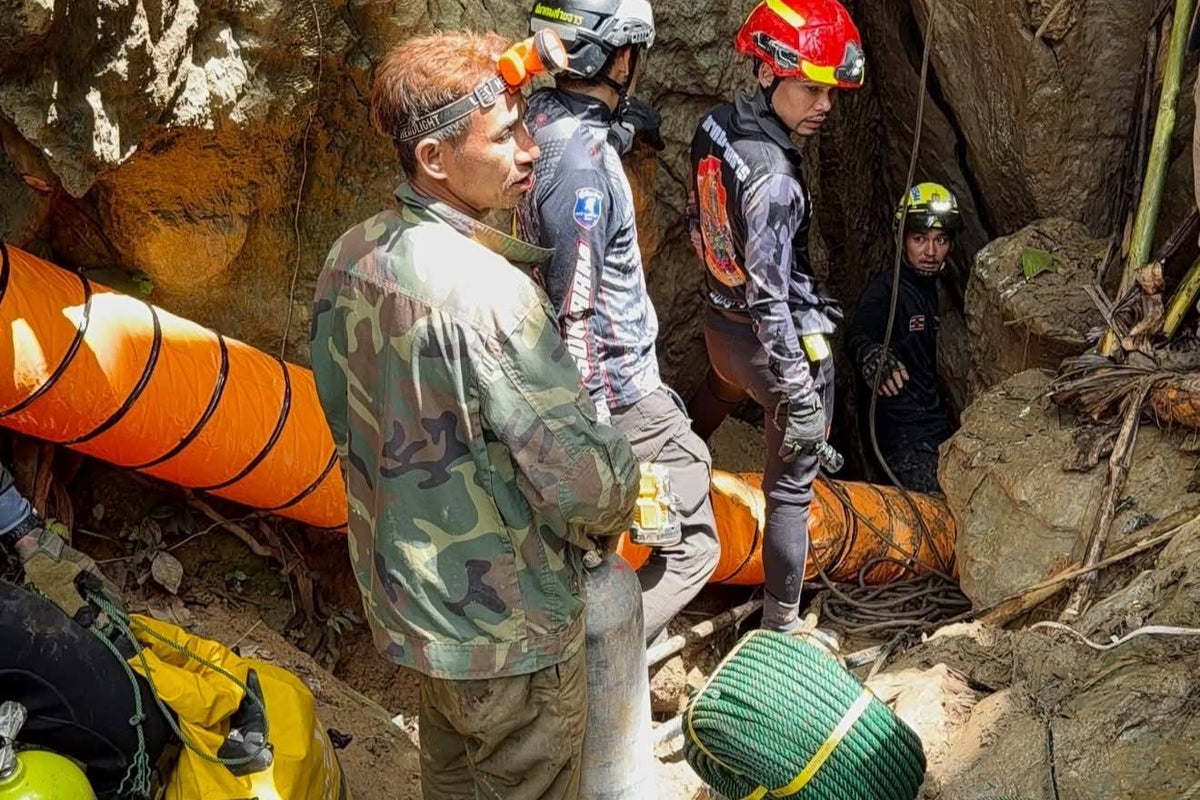 Thai divers from famous 2018 cave rescue join Laos mission to reach seven trapped hunters