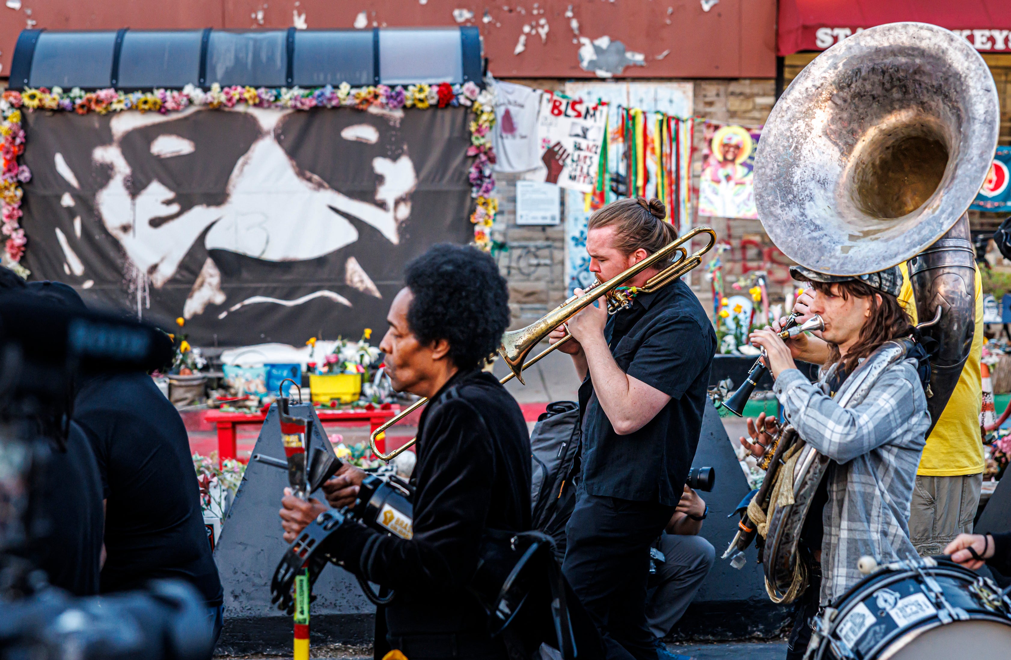 The band Brass Solidarity plays in front of Floyd's memorial during a commemoration event marking the fifth anniversary of his killing