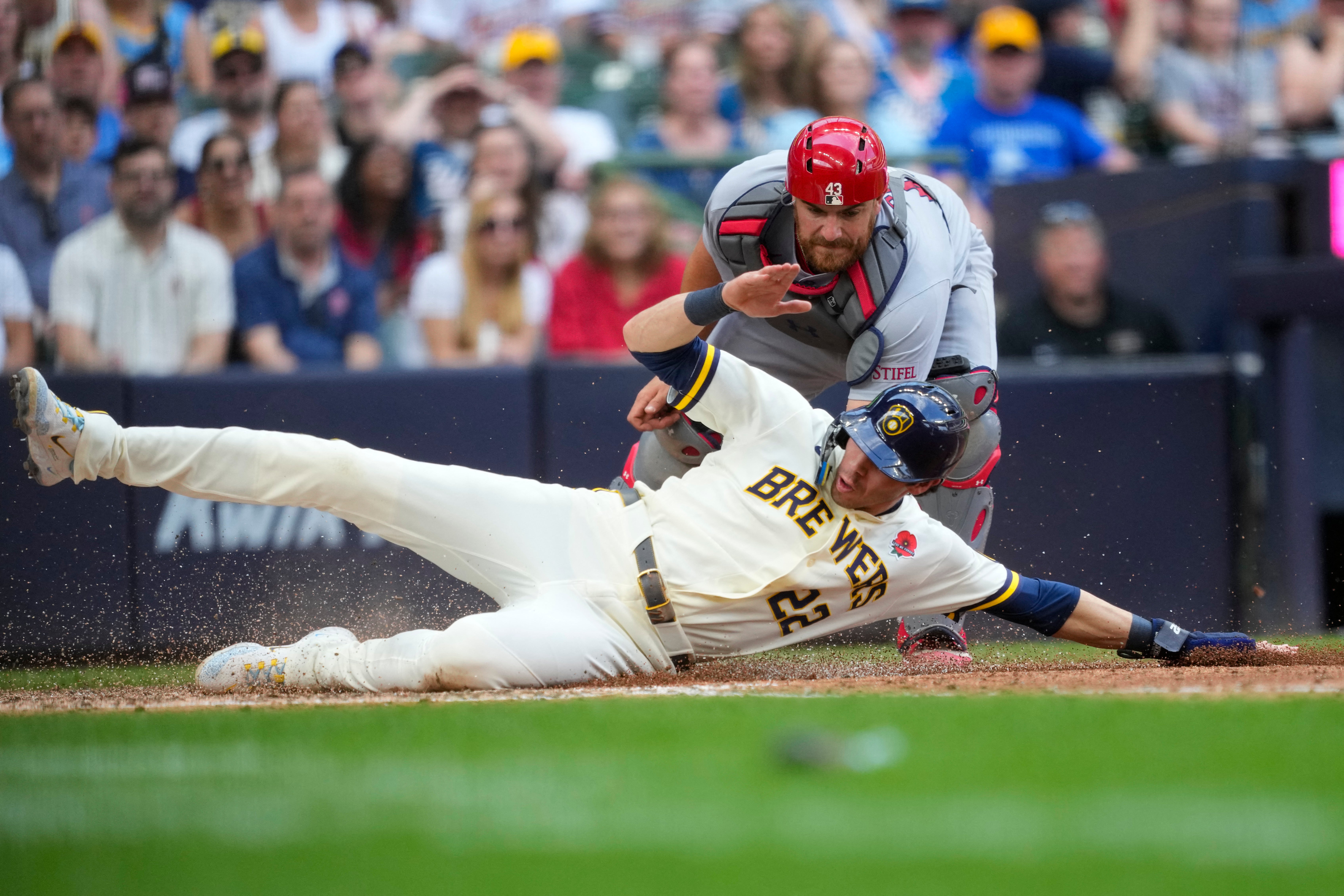 Christian Yelich hit a two-run homer and Andrew Vaughn went 3 for 4