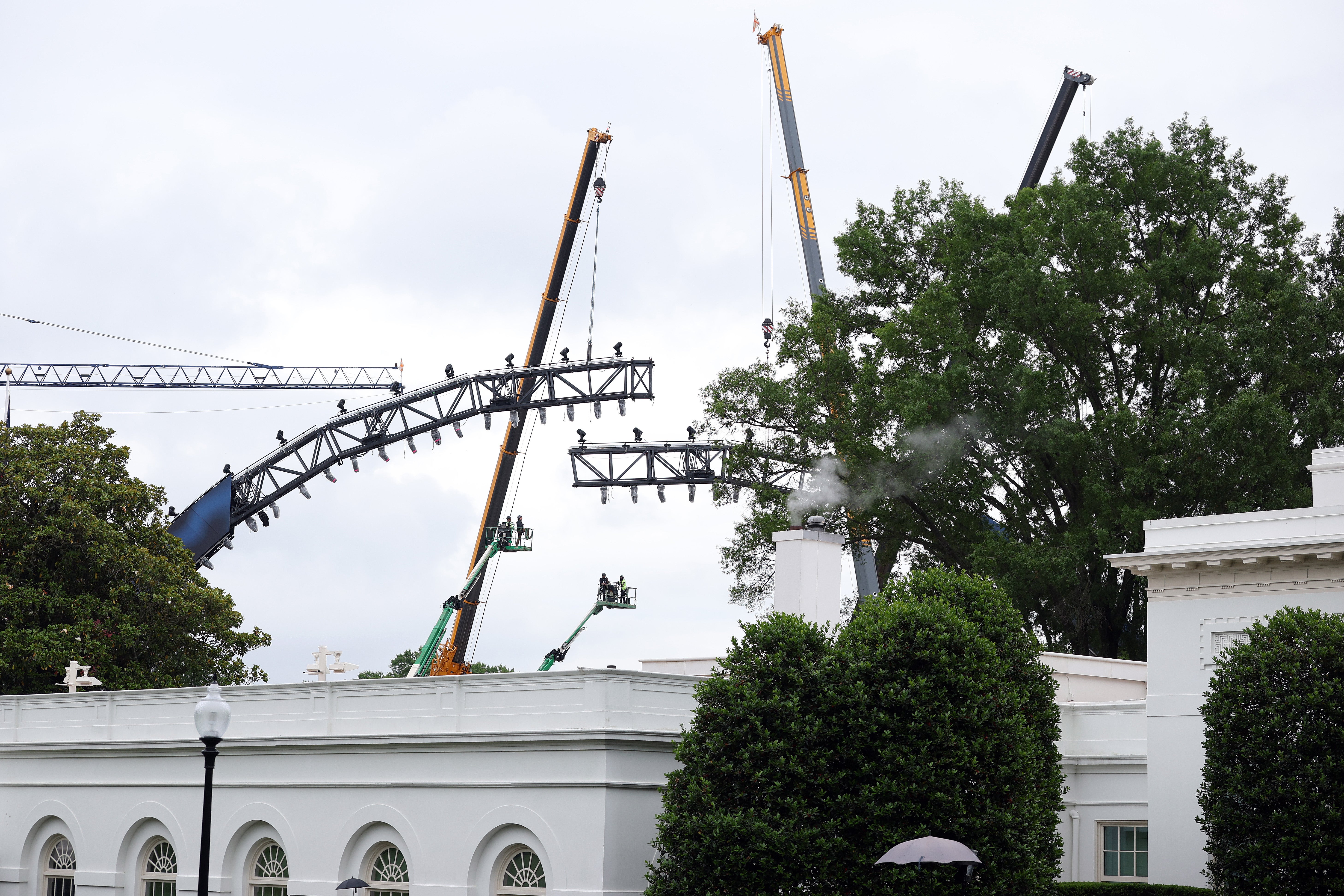 Another photo taken Monday appears to show two sections of the rig being connected, using the cranes