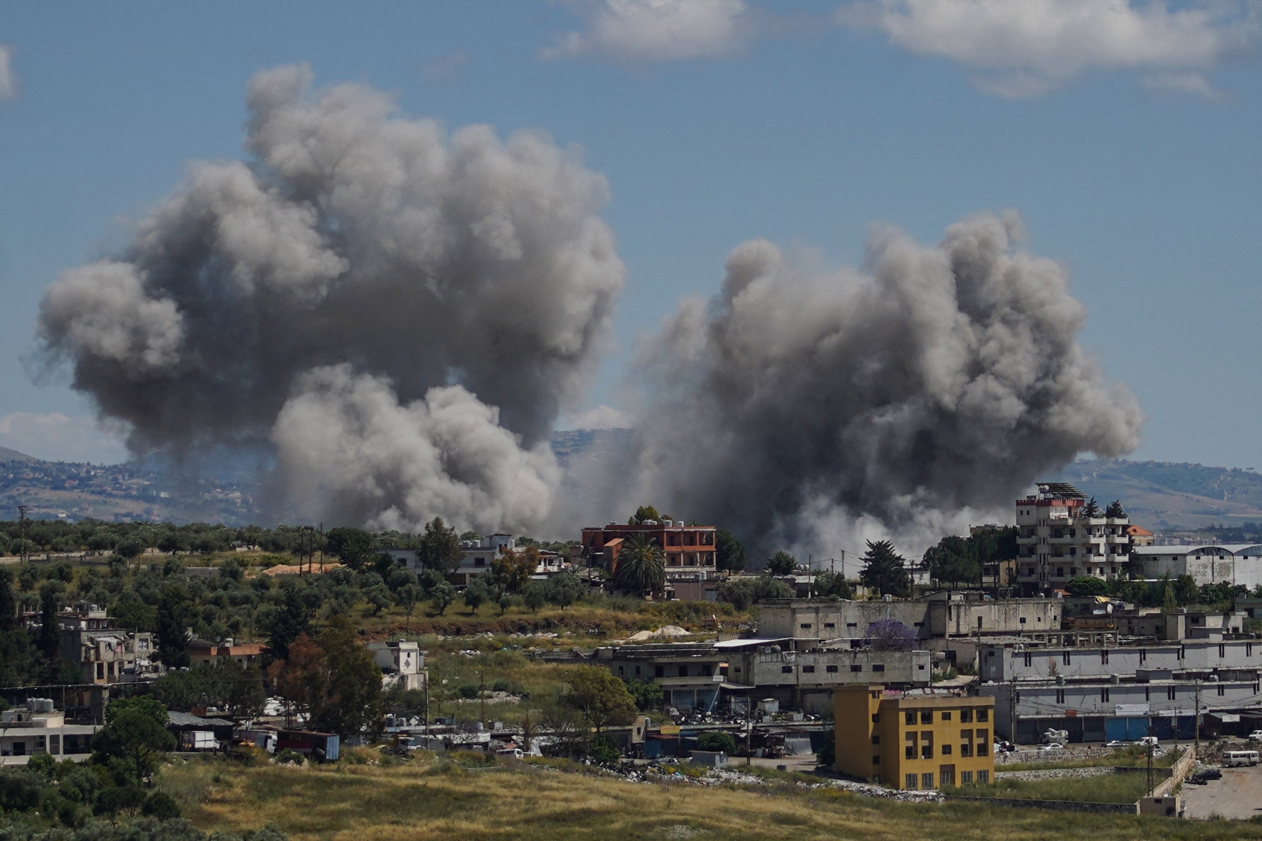 Smoke rises following an Israeli strike on the southern village of Nabatieh on Sunday, May 24 (AFP/Getty)