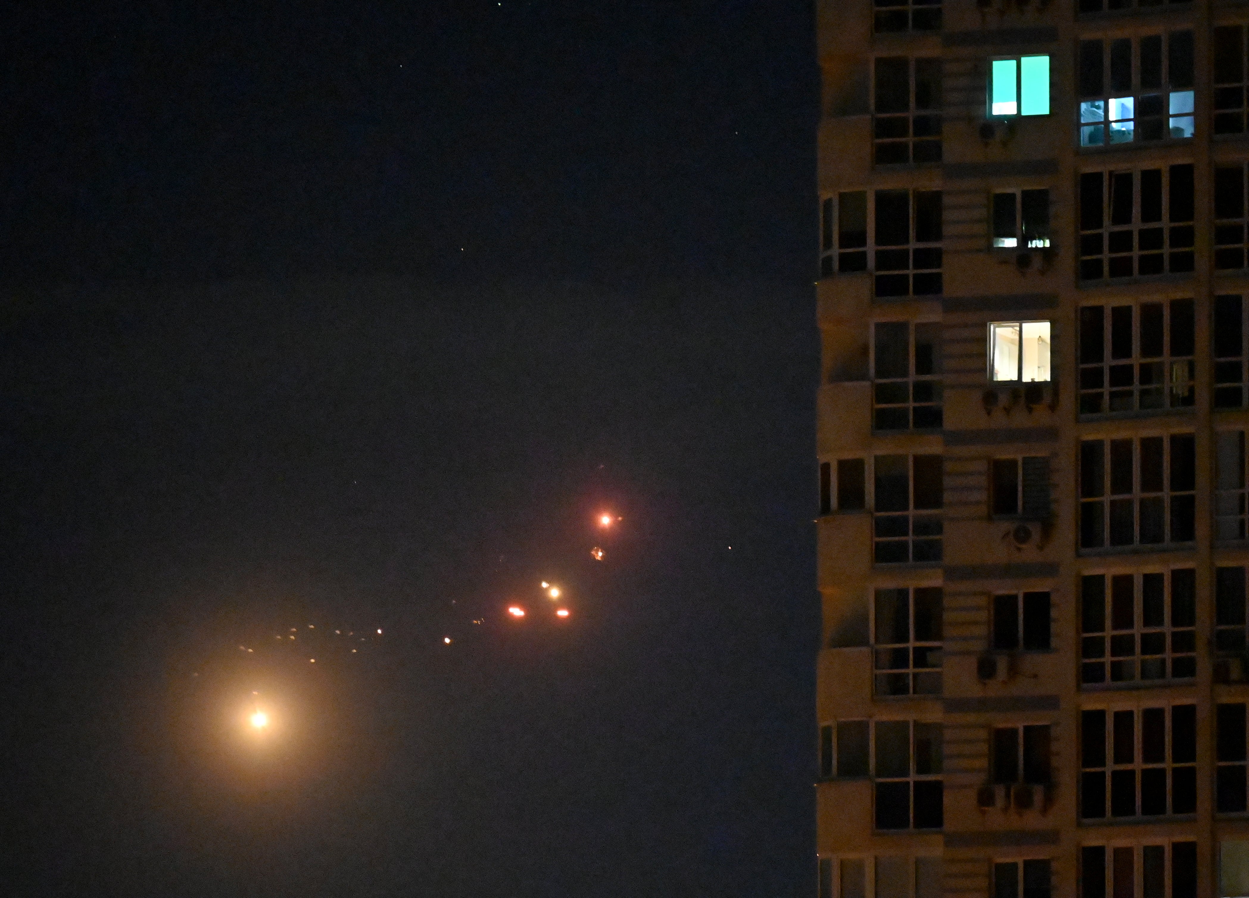 This photo shows Ukrainian air defence firing at Russian drones above Kyiv during a Russian drone and missile strike on the Ukrainian capital (AFP/Getty)