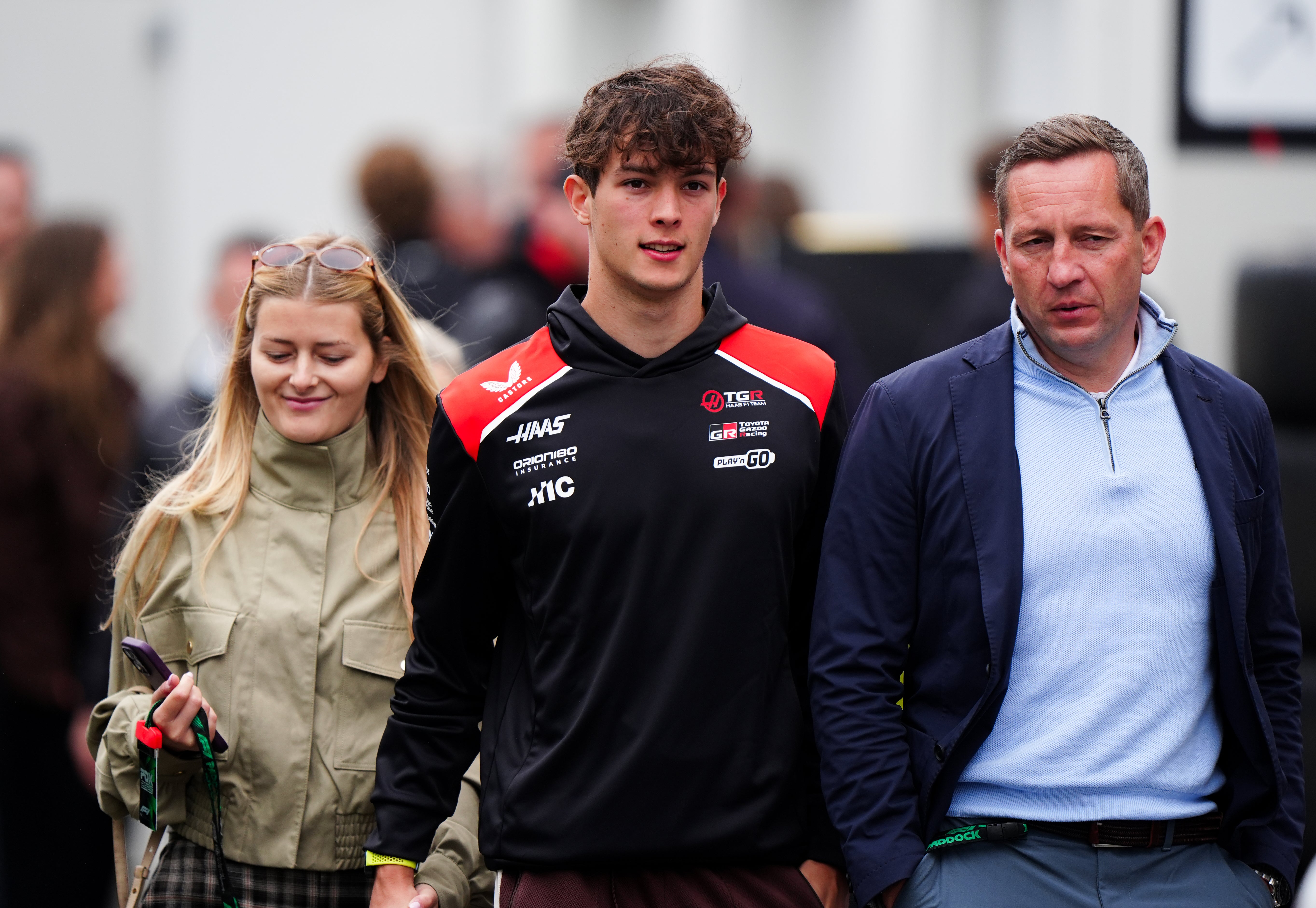 Ollie Bearman arriving with his partner Alicia Torriani (left) and his father David Bearman (right) at the Circuit de Gilles-Villeneuve (Bradley Collyer/PA) (PA Wire)