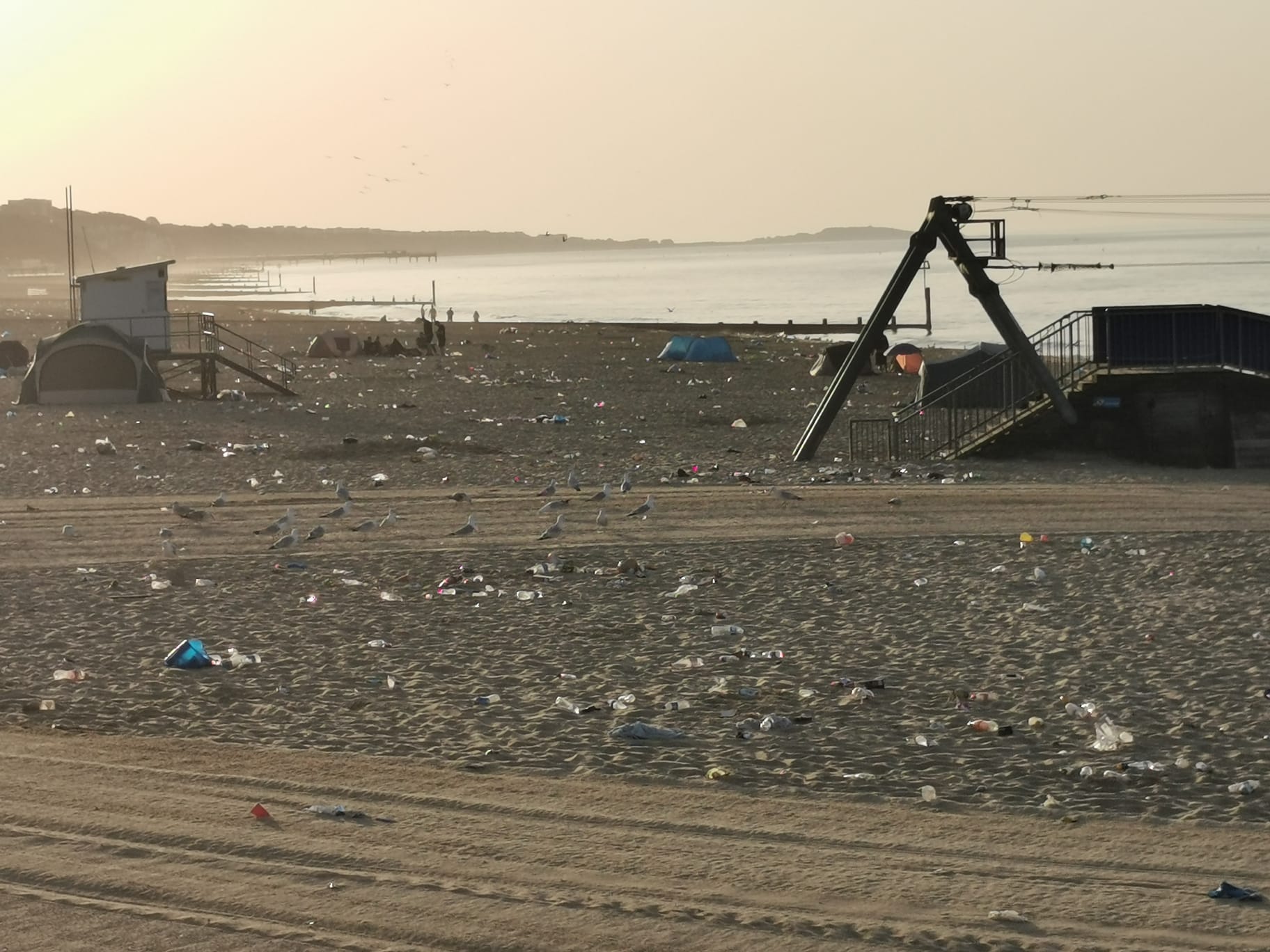 Bournemouth beach buried in rubbish after bank holiday heatwave crowds