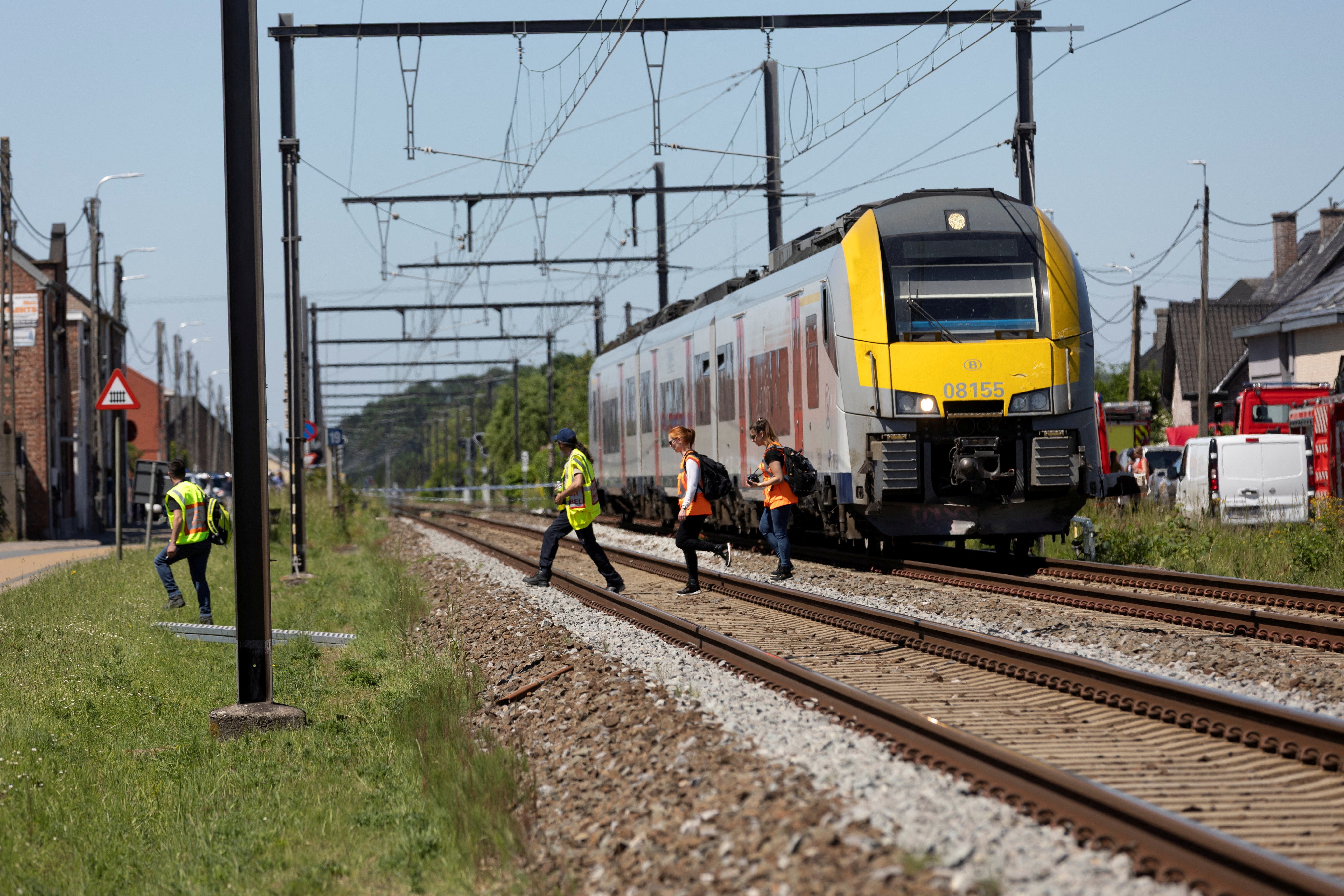 Scene where school bus was struck by train at a level crossing in Belgium (Reuters)