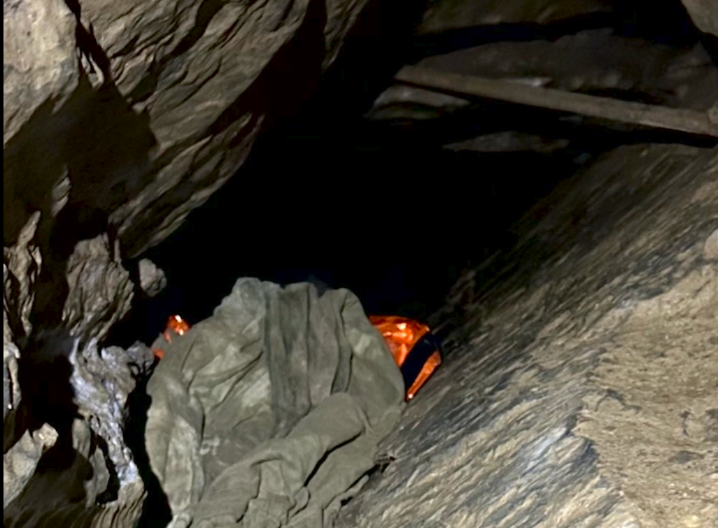 Three of the man's friends had remained in the cave with him and had become hypothermic