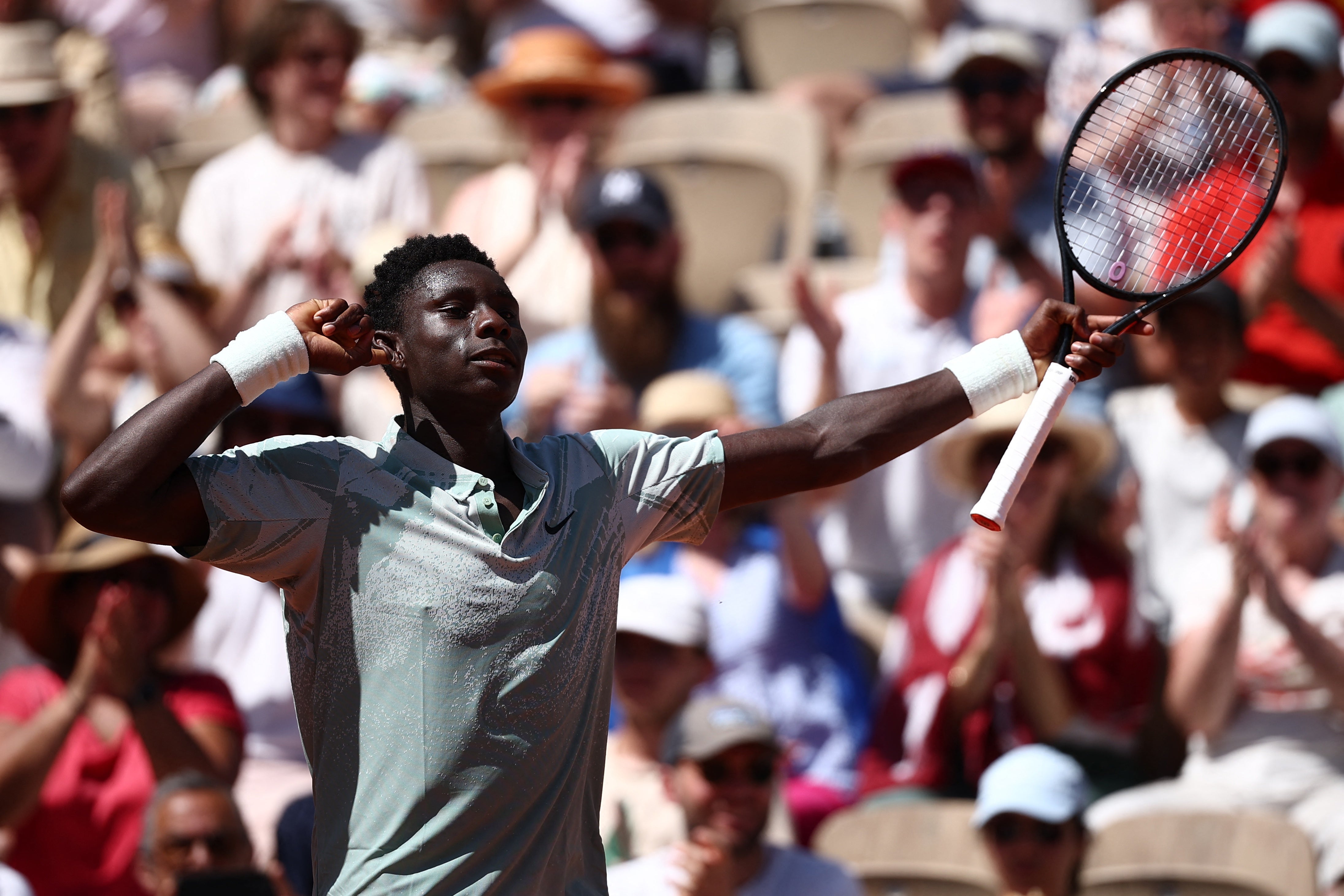 Kouame triumphed in the blazing Paris heat, beating Cilic in straight sets to reach the second round (Reuters)