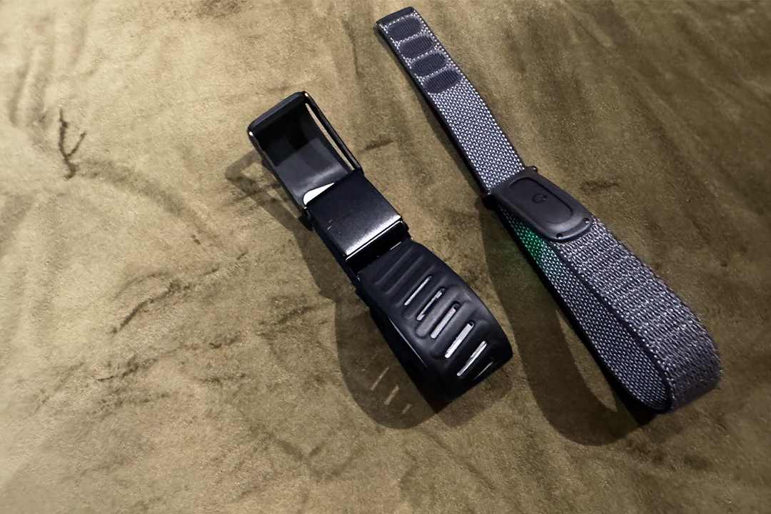 The Whoop is a lot chunkier and bulkier than the Fitbit Air (Alex Lee/The Independent)