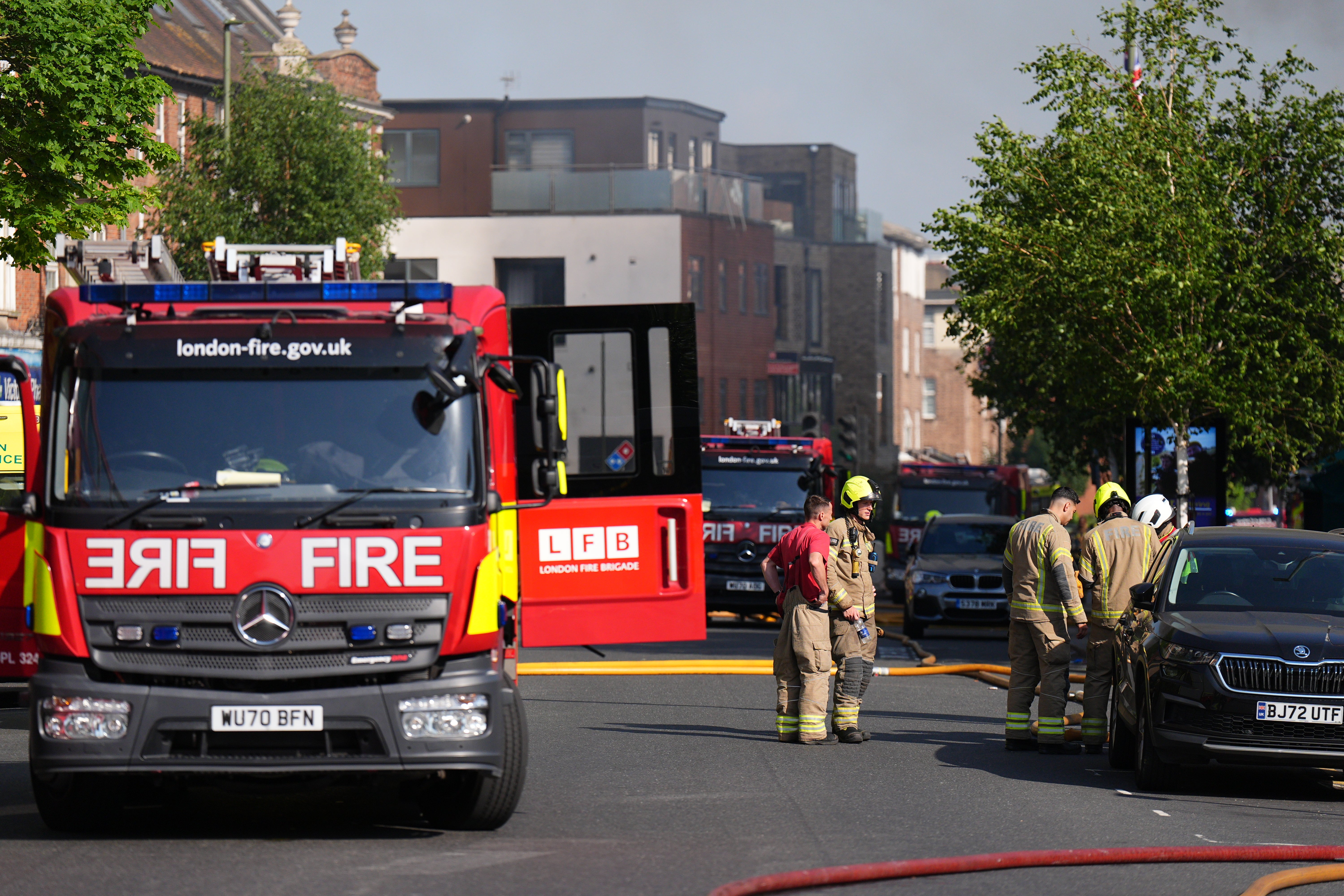Around 100 firefighters are at the scene (PA)