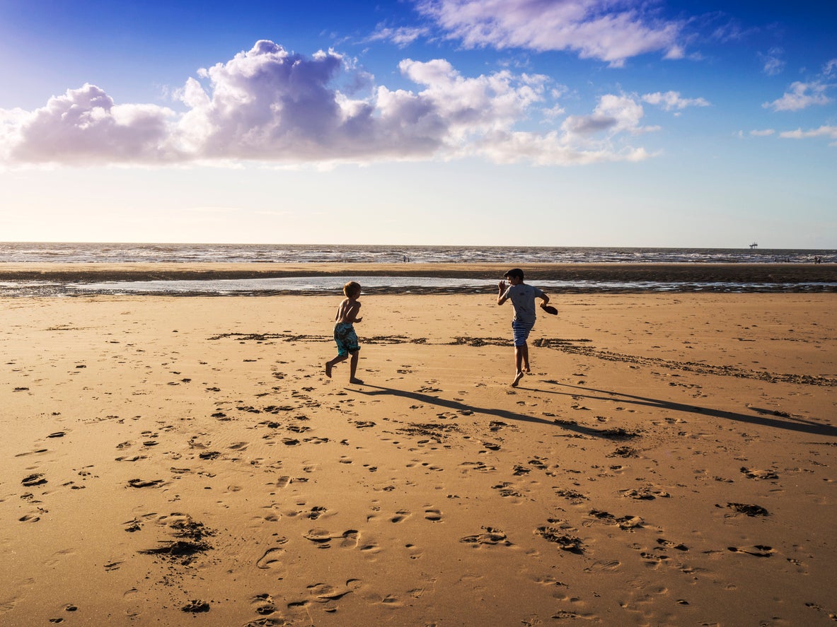 Girl, 15, in critical condition after getting into difficulty in water at Merseyside beach during heatwave