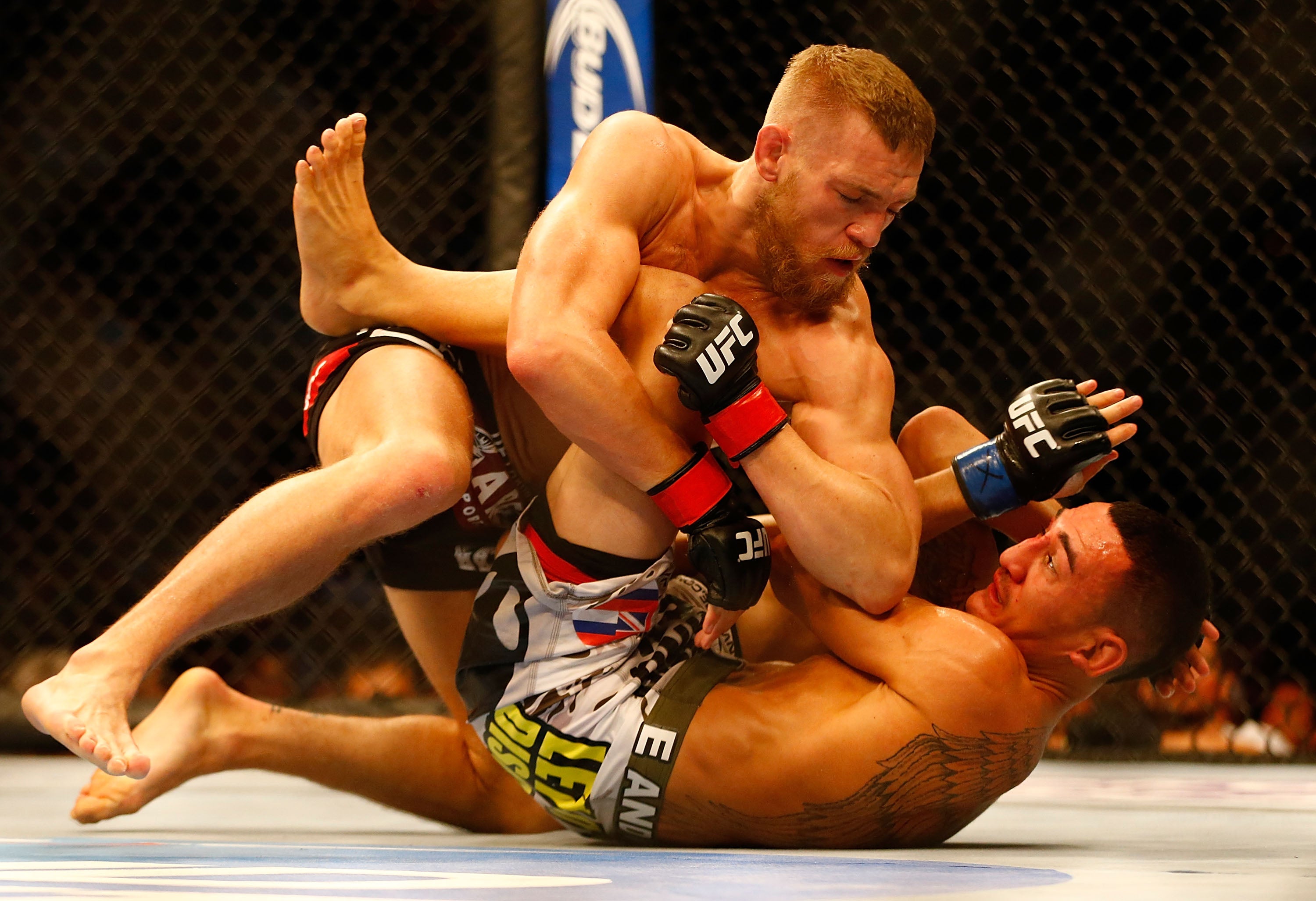 Max Holloway (top) during his 2013 win over Max Holloway
