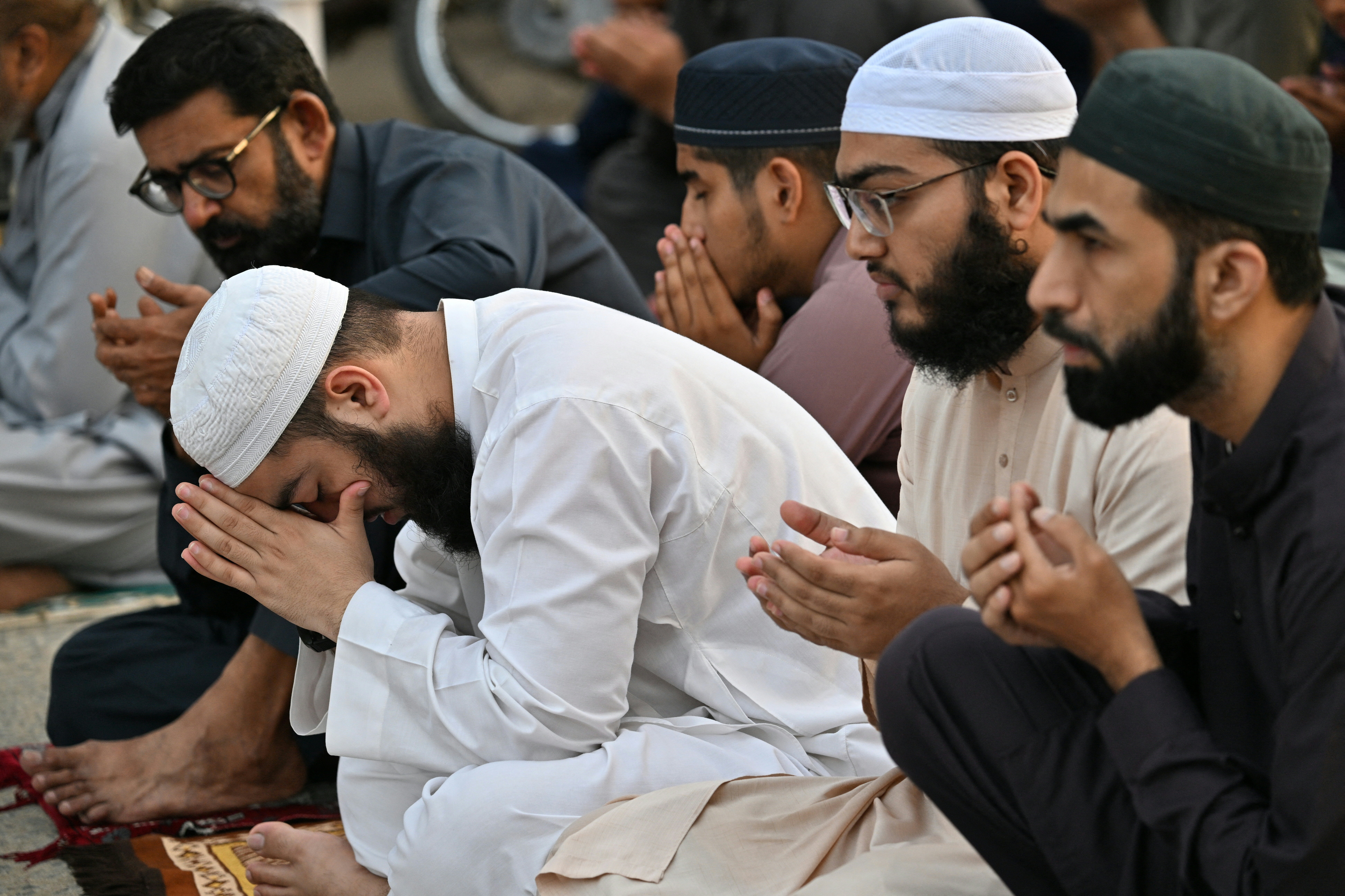 Muslim devotees offer Eid al-Adha prayers at a mosque in Karachi on 27 May 2026