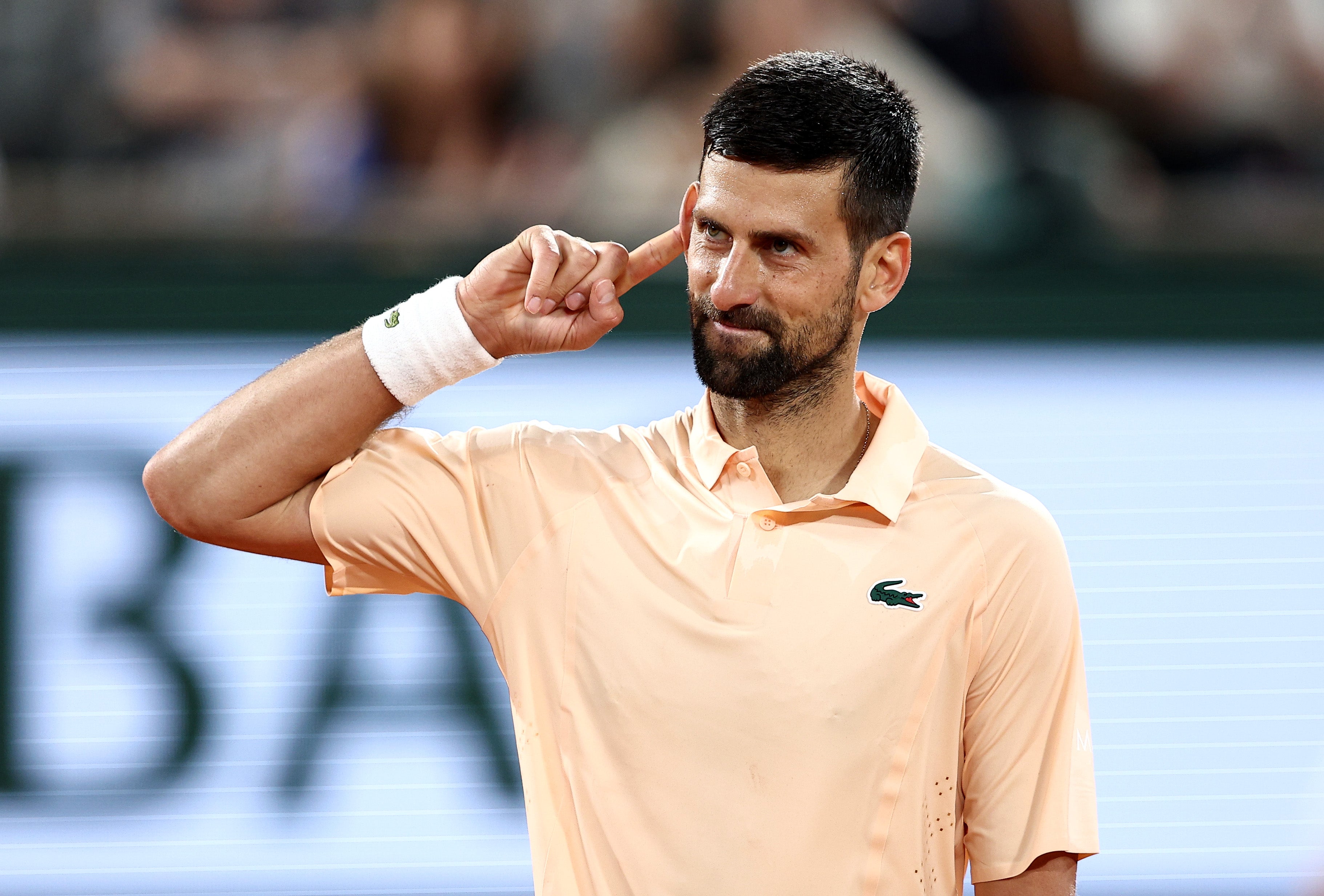 Novak Djokovic plays Valentin Royer bidding to reach the third round of Roland Garros